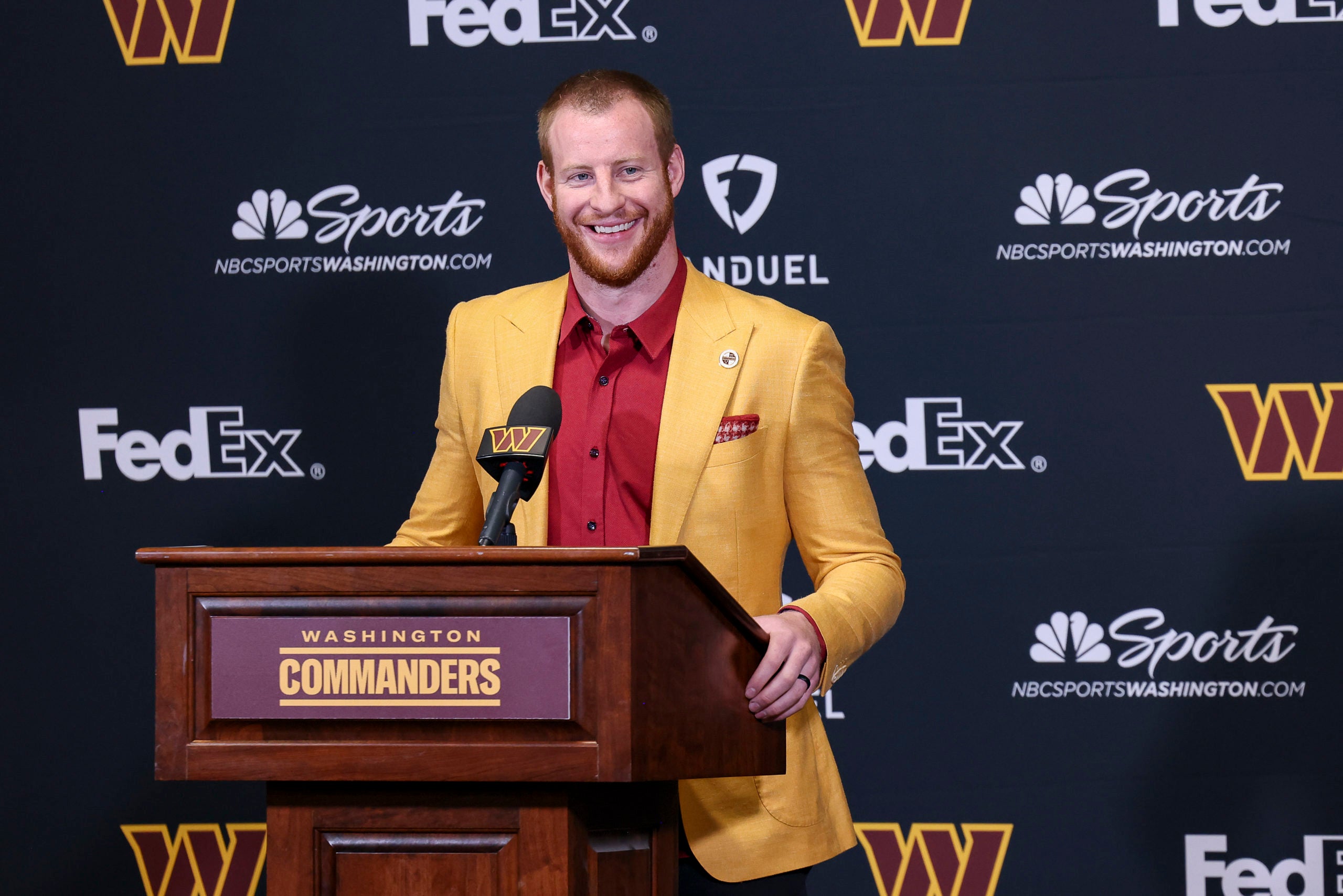 Mar 17, 2022; Ashburn, VA, USA;  Washington Commanders quarterback Carson Wentz addresses the media at Inova Sports Performance Center Auditorium. Mandatory Credit: John McCreary-USA TODAY Sports