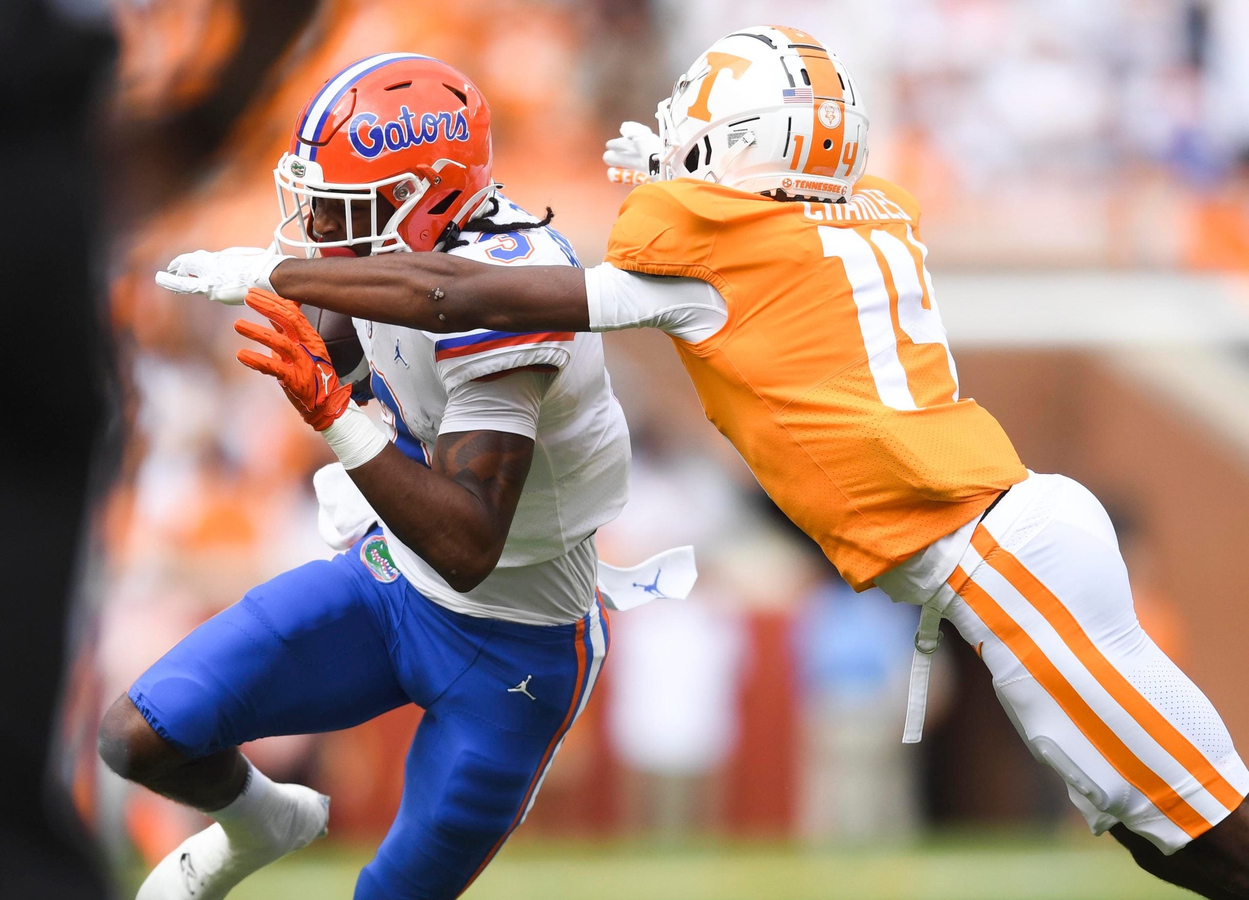 Tennessee defensive back Christian Charles (14) tackes Florida wide receiver Xzavier Henderson (3) during an NCAA college football game on Saturday, September 24, 2022 in Knoxville, Tenn. Utvflorida0924
