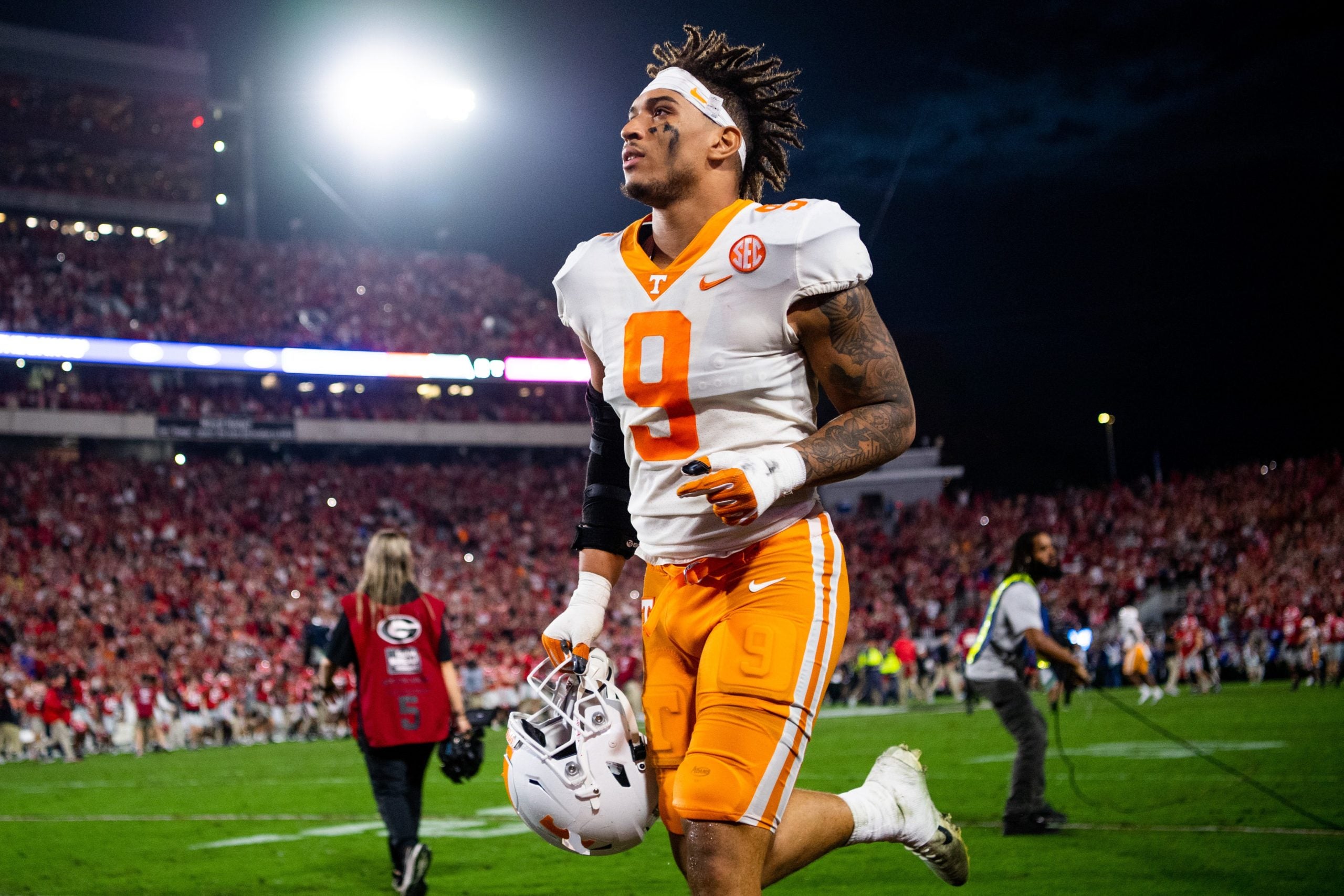 Tennessee defensive lineman/linebacker Tyler Baron (9) runs off the field after Tennessee's game against Georgia at Sanford Stadium in Athens, Ga., on Saturday, Nov. 5, 2022. Kns Vols Georgia Bp