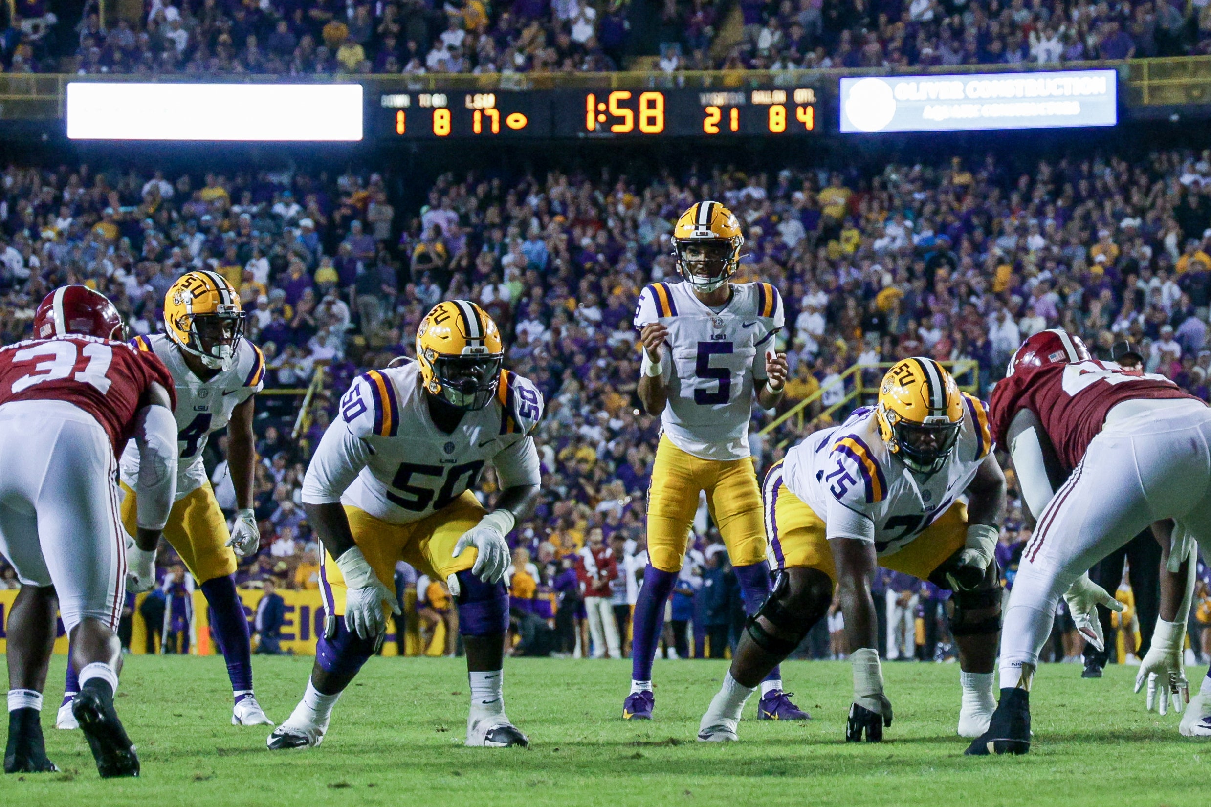 Nov 5, 2022; Baton Rouge, Louisiana, USA; LSU Tigers quarterback Jayden Daniels (5) calls for the ball against the Alabama Crimson Tide during the second half at Tiger Stadium. Mandatory Credit: Stephen Lew-USA TODAY Sports