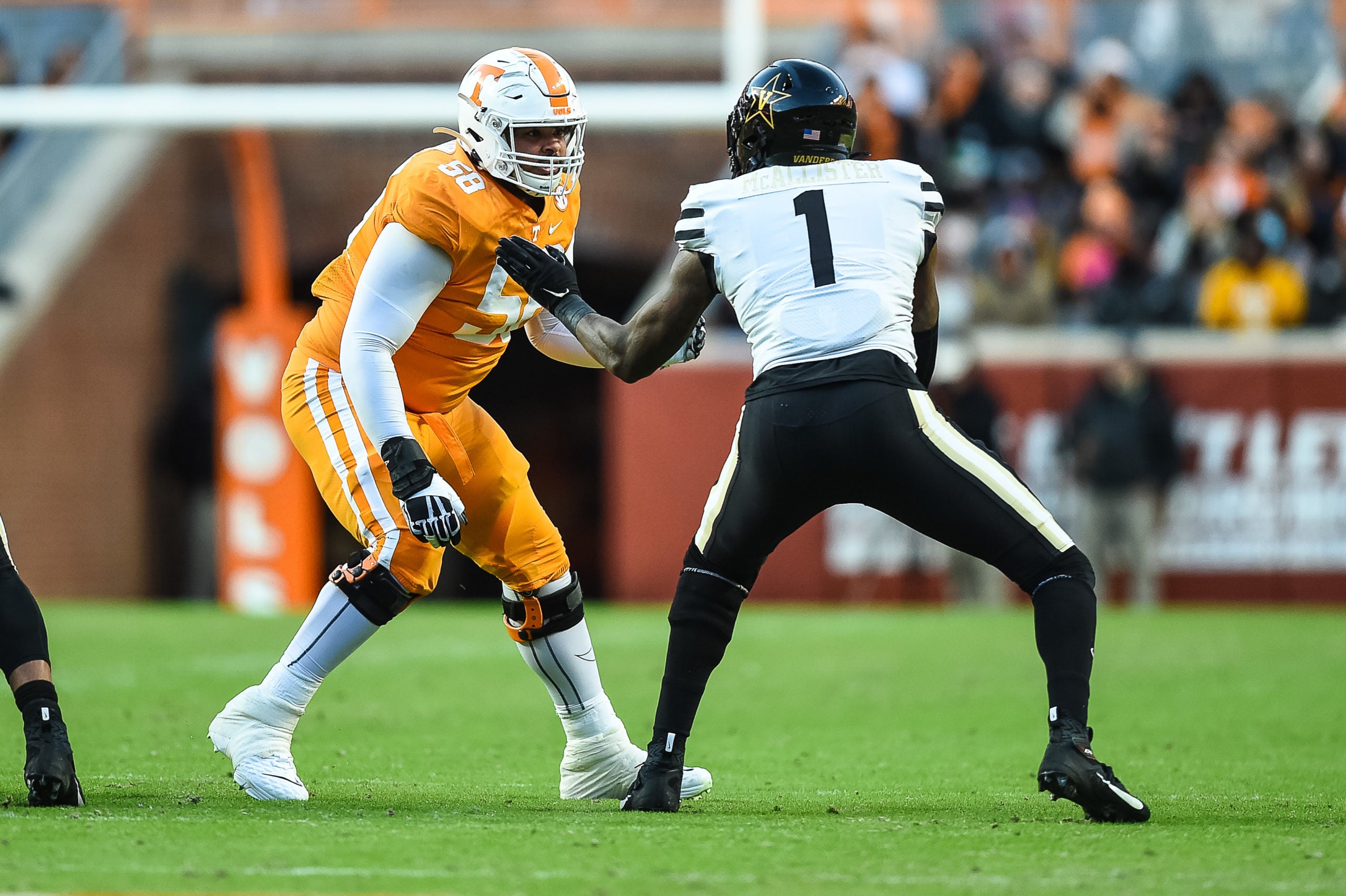 Nov 27, 2021; Knoxville, Tennessee, USA; Tennessee Volunteers offensive lineman Darnell Wright (58) blocks Vanderbilt Commodores linebacker Elijah McAllister (1) during the first half at Neyland Stadium. Mandatory Credit: Bryan Lynn-USA TODAY Sports