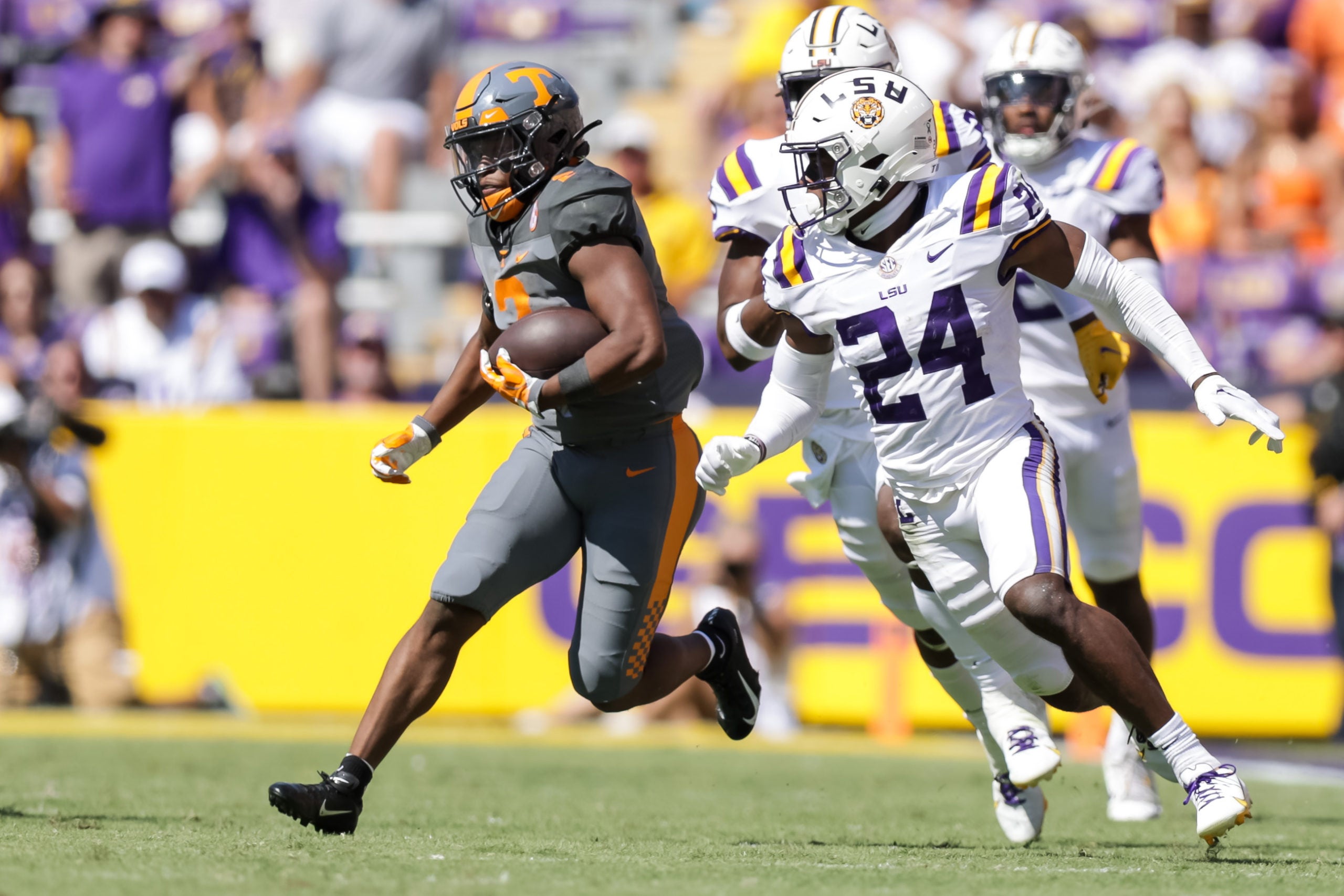 Oct 8, 2022; Baton Rouge, Louisiana, USA;  Tennessee Volunteers running back Jabari Small (2) is tackled by LSU Tigers cornerback Jarrick Bernard-Converse (24) during the second half at Tiger Stadium. Mandatory Credit: Stephen Lew-USA TODAY Sports