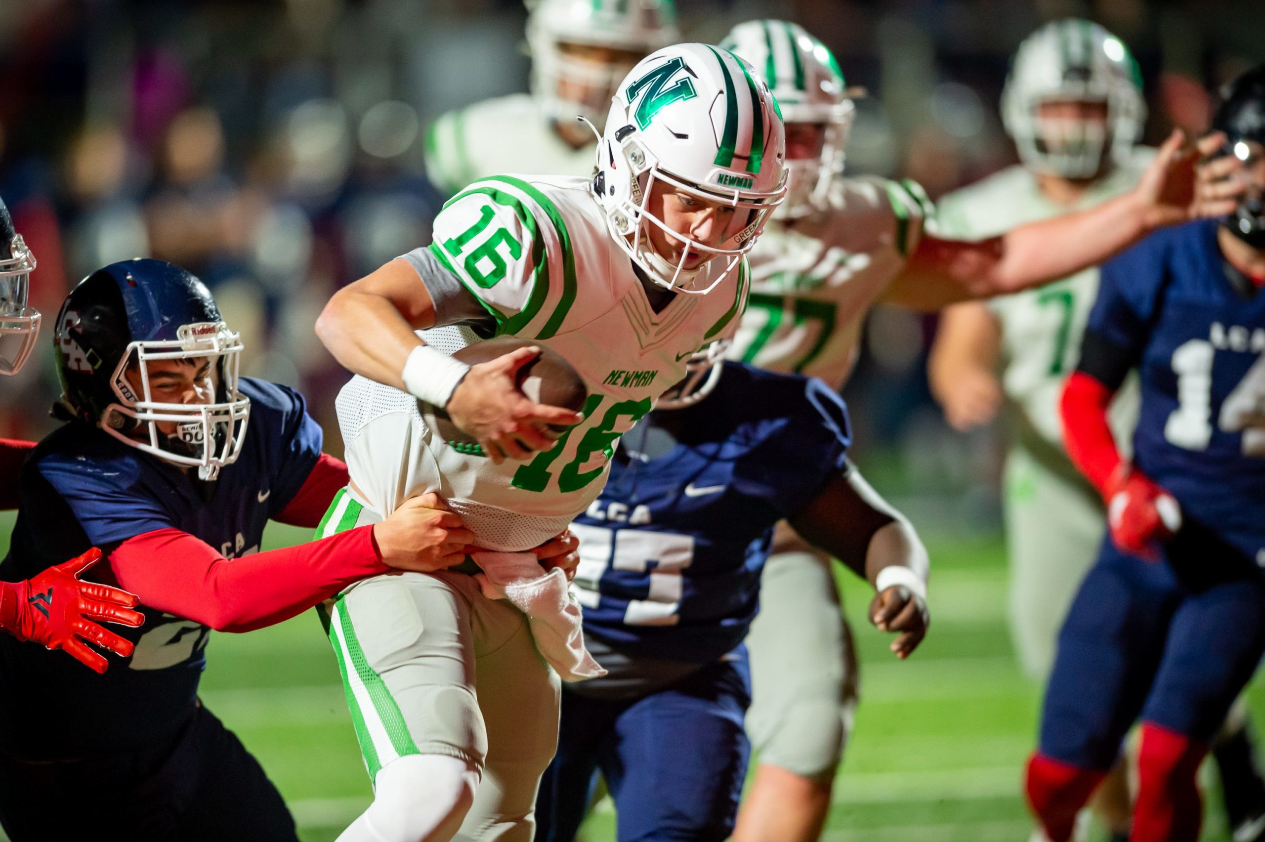 Quarterback Arch Manning 16 runs the ball and scores a touchdown as Newman takes on Lafayette Christian Academy in the LHSAA Div III semi finals.  Wednesday, Nov. 24, 2021. Arch Manning Lca Vs Newman Football 4988