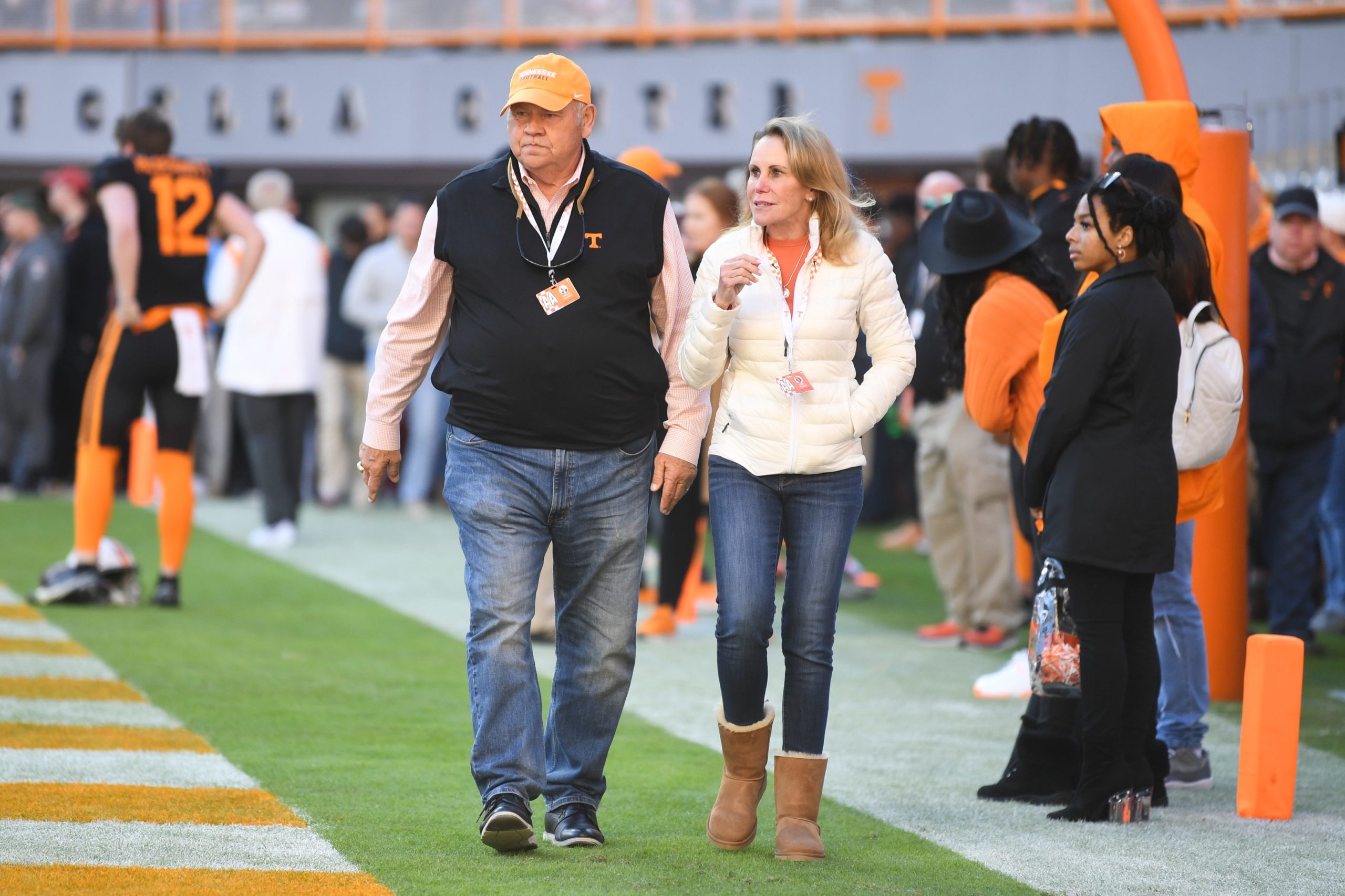 Former Tennessee athletic director Phillip Fulmer and wife Vicky walk on the sidelines before an SEC football game between the Tennessee Volunteers and the Georgia Bulldogs in Neyland Stadium in Knoxville on Saturday, Nov. 13, 2021. Tennesseegeorgia1113 0727