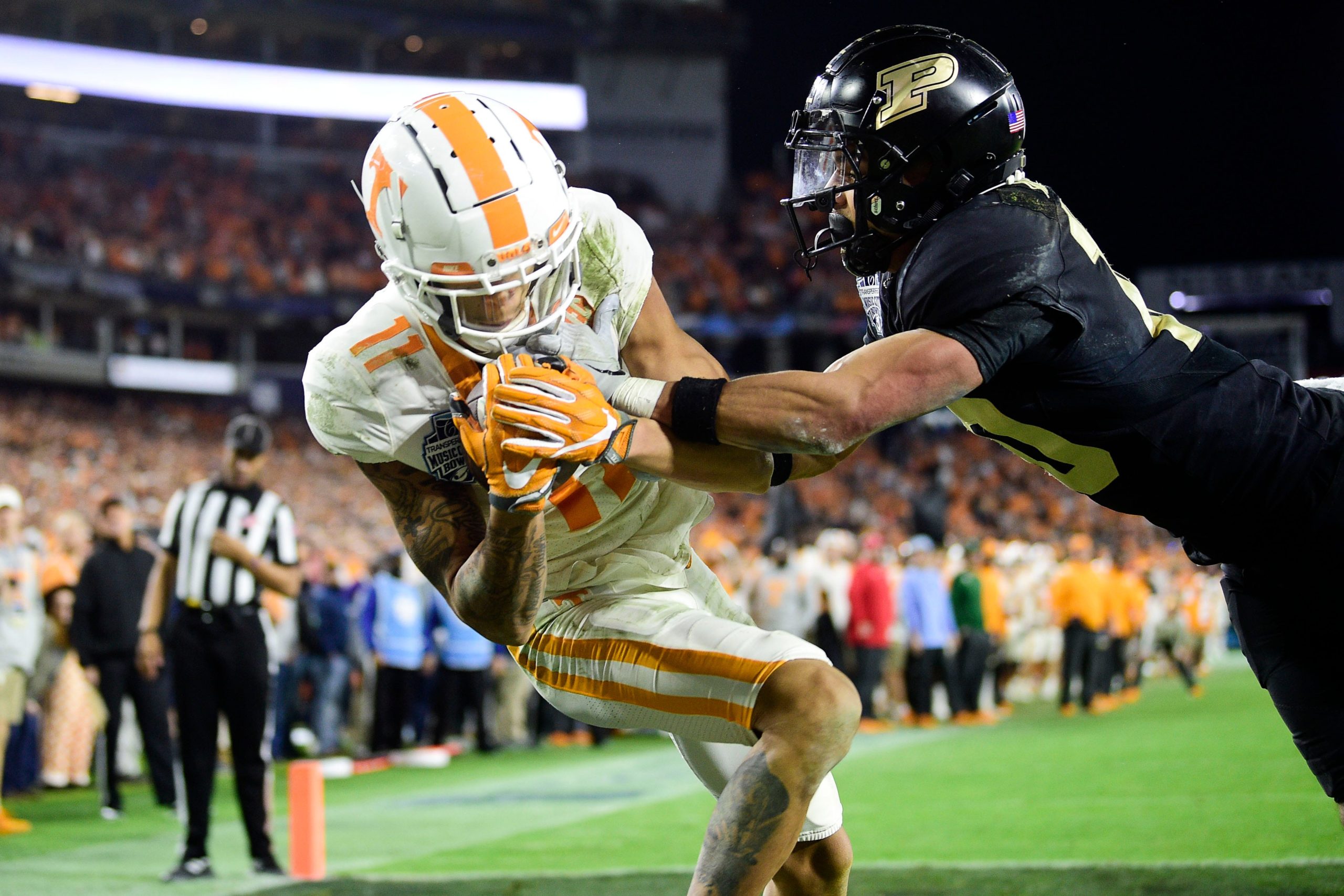 Tennessee wide receiver Jalin Hyatt (11) scores a touchdown past Purdue safety Cam Allen (10) at the 2021 Music City Bowl NCAA college football game at Nissan Stadium in Nashville, Tenn. on Thursday, Dec. 30, 2021. Kns Tennessee Purdue