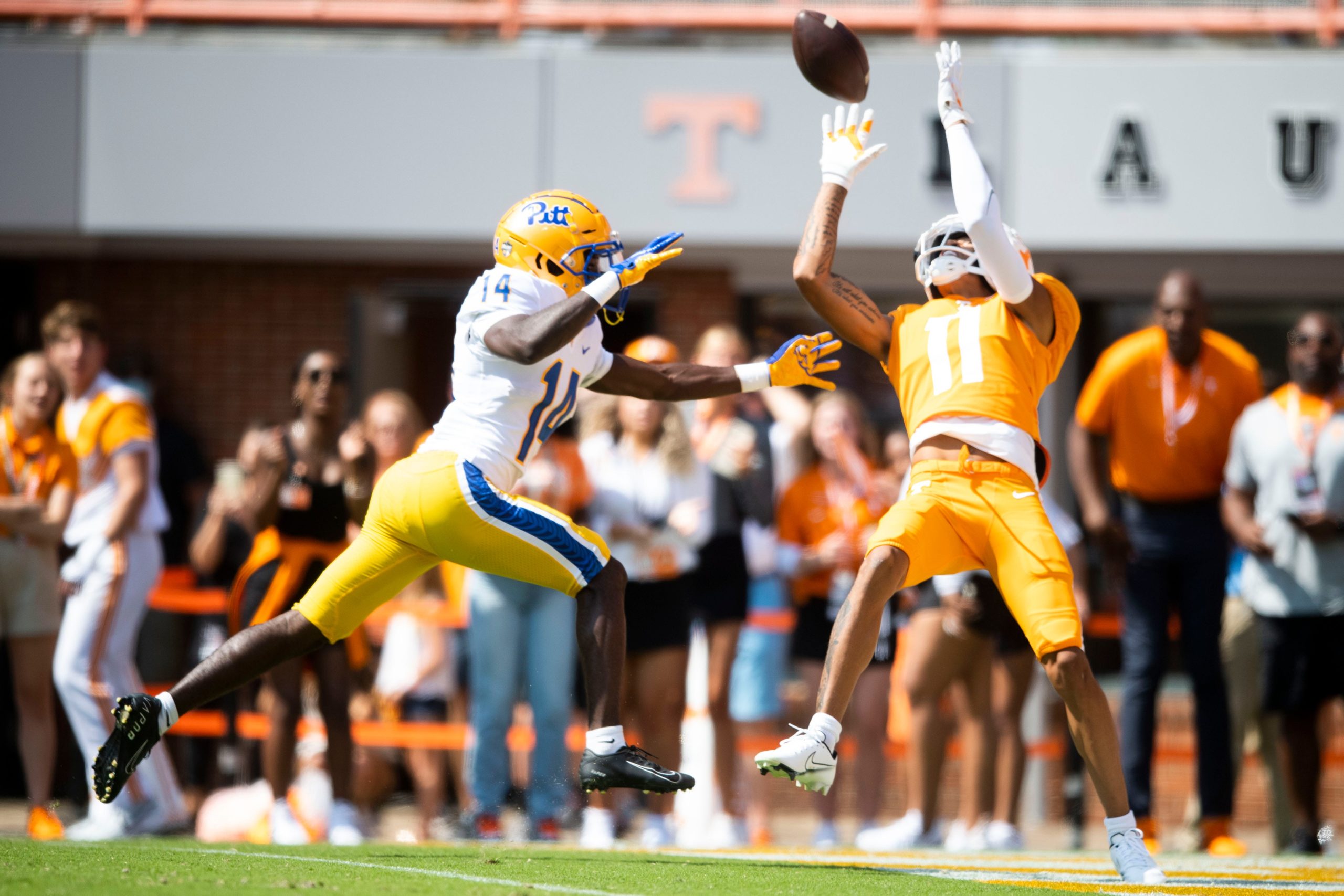 Tennessee wide receiver Jalin Hyatt (11) goes for a catch on a touchdown attempt in the end zone as Pittsburgh defensive back Marquis Williams (14) defends during a game against Pittsburgh at Neyland Stadium in Knoxville, Tenn. on Saturday, Sept. 11, 2021. Kns Tennessee Pittsburgh Football