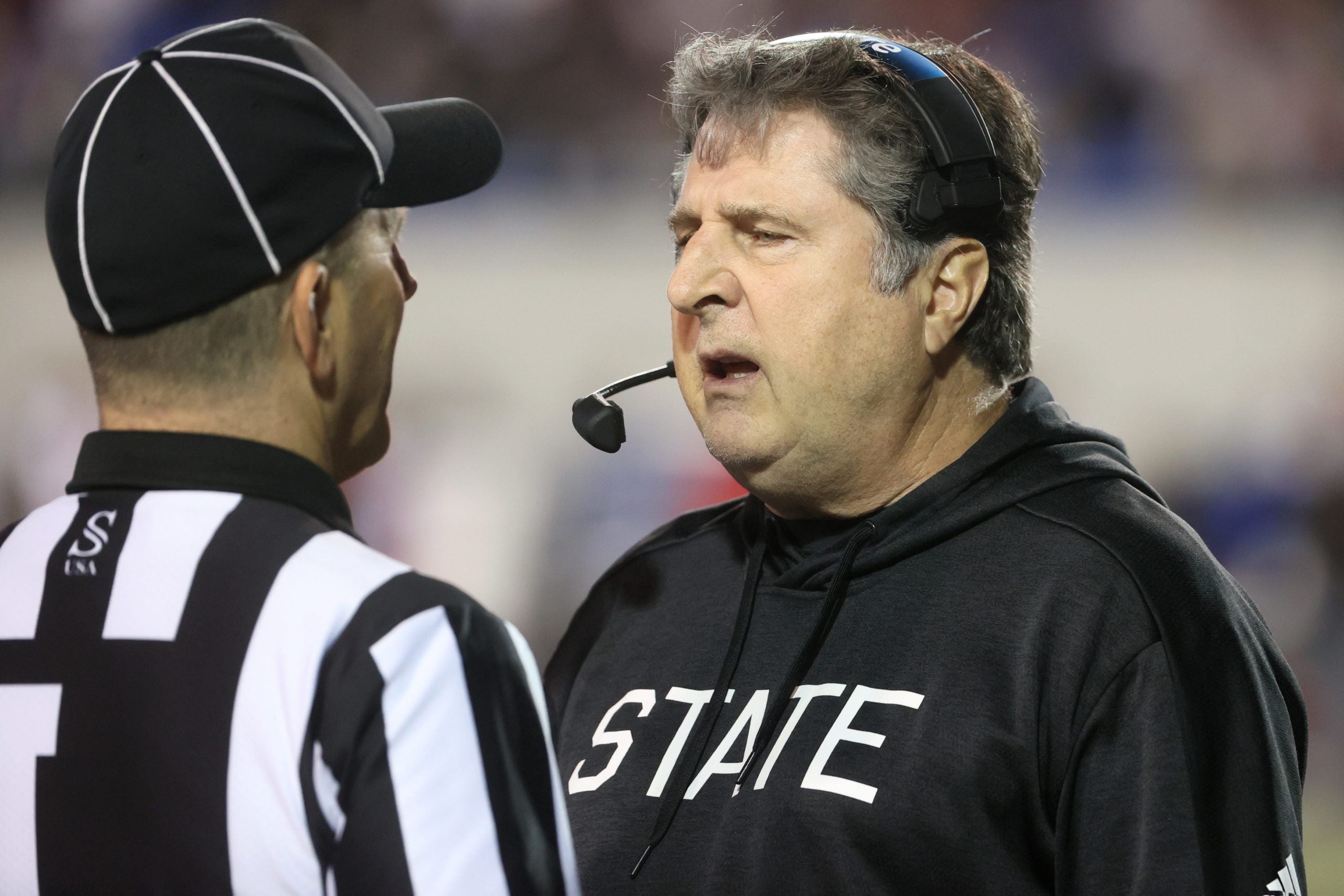 Mississippi State Bulldogs Head Coach Mike Leach talks to the referee after a turnover by his team to the Texas Tech Red Raiders during the AutoZone Liberty Bowl at Liberty Bowl Memorial Stadium on Tuesday, Dec. 28, 2021. Jrca6433