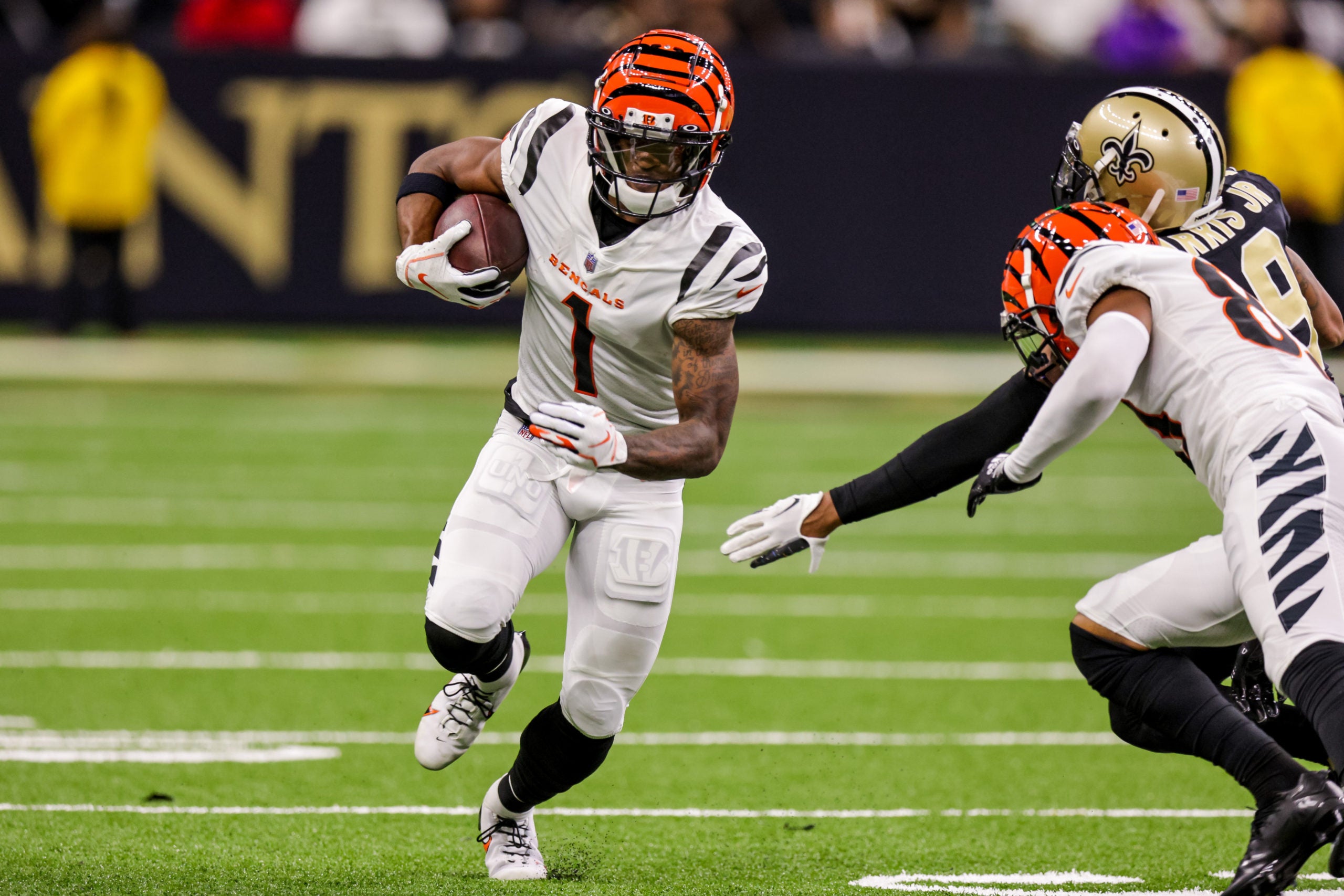 Oct 16, 2022; New Orleans, Louisiana, USA; Cincinnati Bengals wide receiver Ja'Marr Chase (1) runs against the New Orleans Saints during the first half at Caesars Superdome. Mandatory Credit: Stephen Lew-USA TODAY Sports