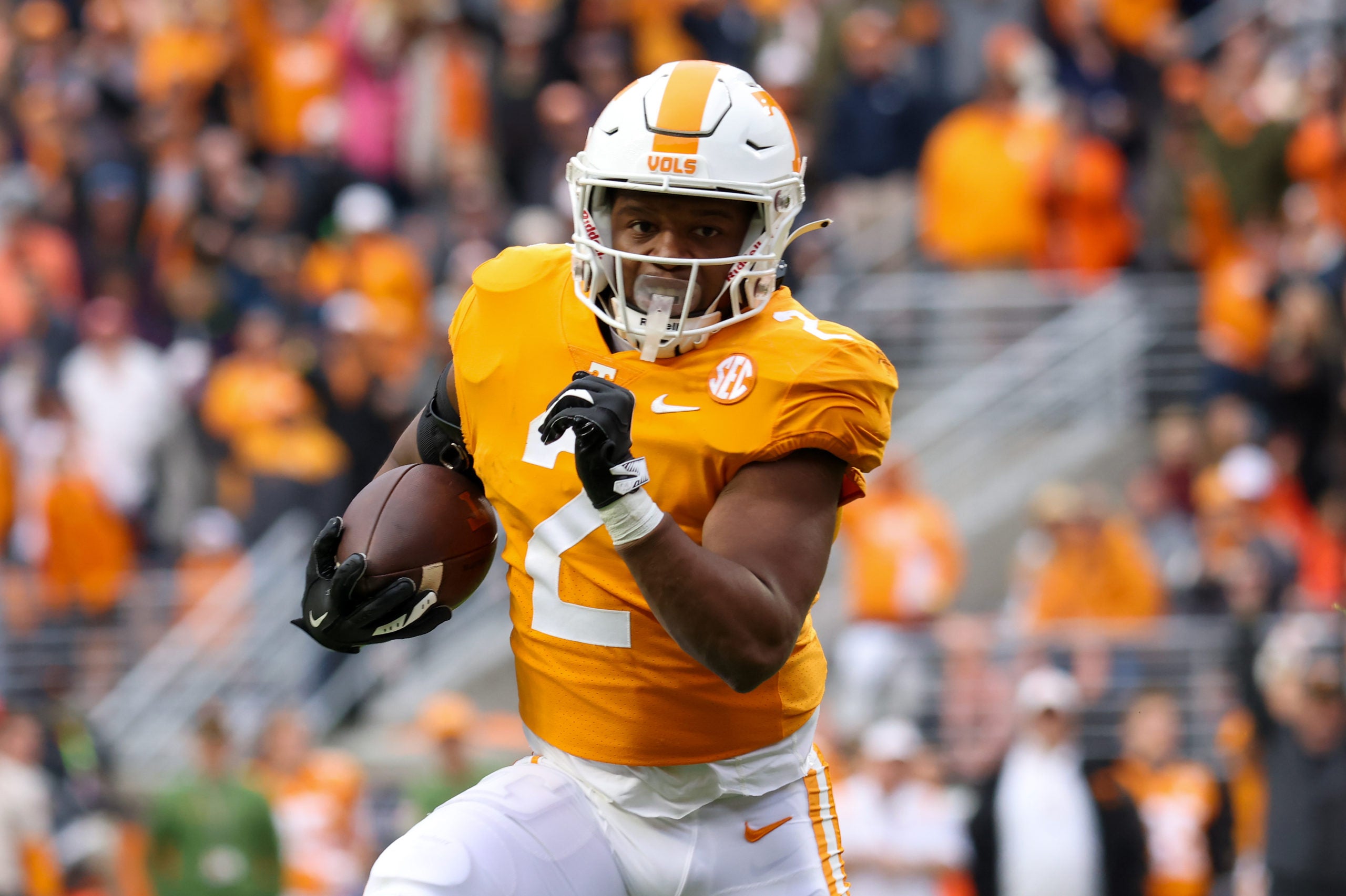 Nov 12, 2022; Knoxville, Tennessee, USA; Tennessee Volunteers running back Jabari Small (2) runs for a touchdown against the Missouri Tigers during the first half at Neyland Stadium. Mandatory Credit: Randy Sartin-USA TODAY Sports