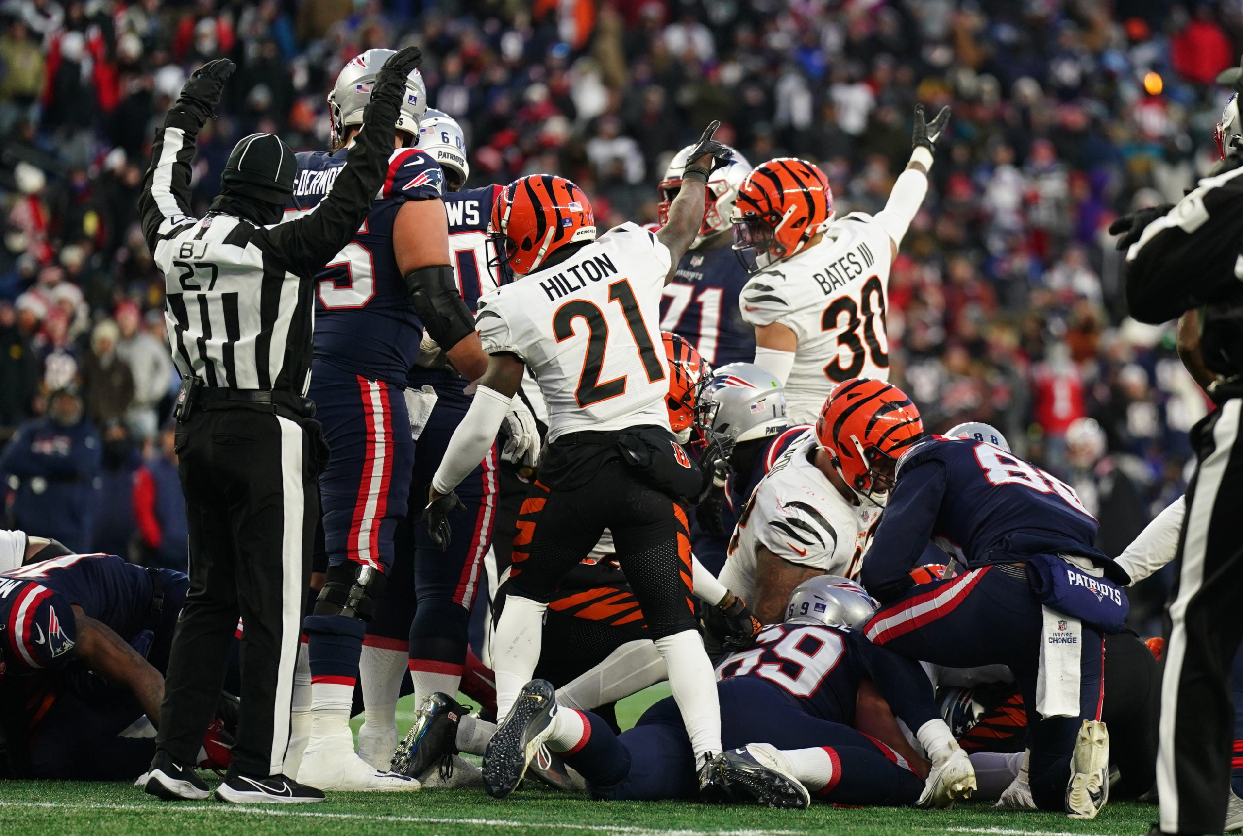 Dec 24, 2022; Foxborough, Massachusetts, USA; Cincinnati Bengals cornerback Mike Hilton (21) and safety Jessie Bates III (30) reacts after the New England Patriots turn over the ball in the fourth quarter at Gillette Stadium. Mandatory Credit: David Butler II-USA TODAY Sports