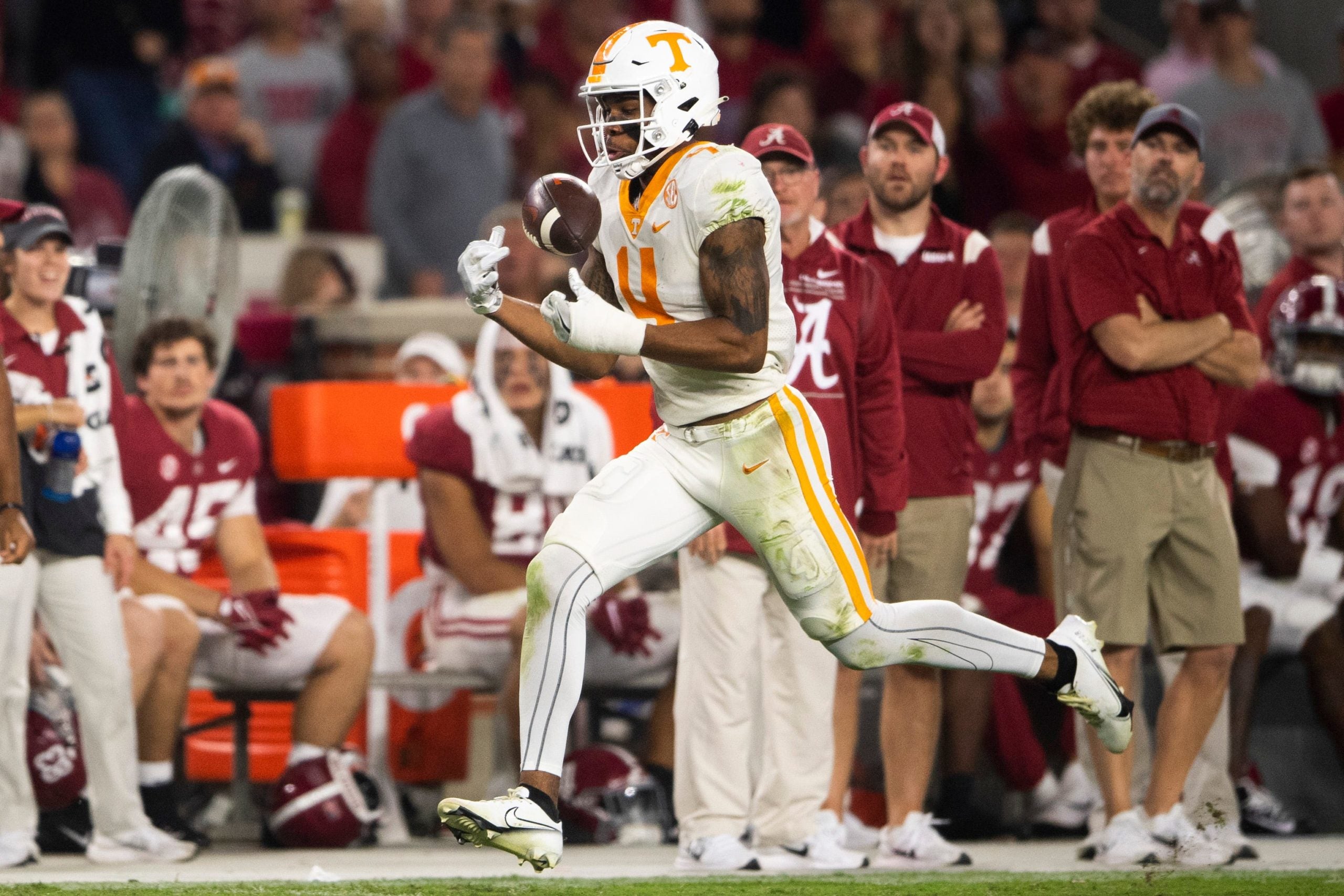 Tennessee wide receiver Cedric Tillman (4) catches the ball en route to a touchdown during a football game between the Tennessee Volunteers and the Alabama Crimson Tide at Bryant-Denny Stadium in Tuscaloosa, Ala., on Saturday, Oct. 23, 2021. Kns Tennessee Alabama Football Bp