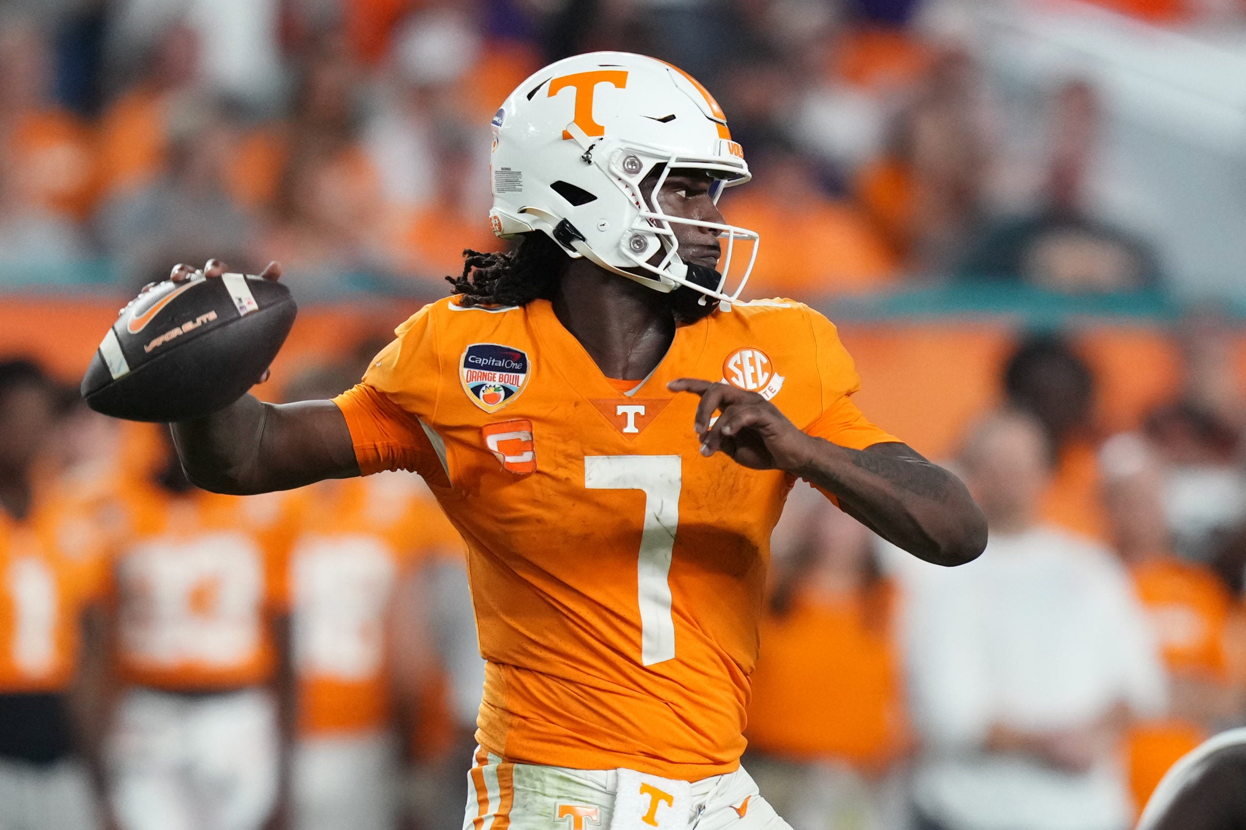 Dec 30, 2022; Miami Gardens, FL, USA; Tennessee Volunteers quarterback Joe Milton III (7) throws a pass against the Clemson Tigers during the second half of the 2022 Orange Bowl at Hard Rock Stadium. Mandatory Credit: Jasen Vinlove-USA TODAY Sports