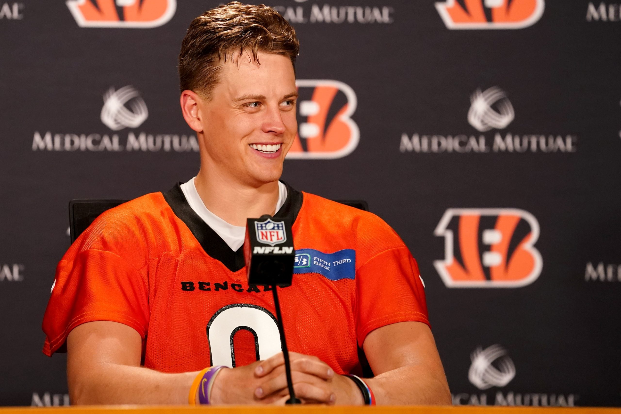 Cincinnati Bengals quarterback Joe Burrow (9) takes questions from reporters at the conclusion of organized team activities practice, Tuesday, June 14, 2022, at Paul Brown Stadium in Cincinnati. Cincinnati Bengals Football Practice June 14 0061