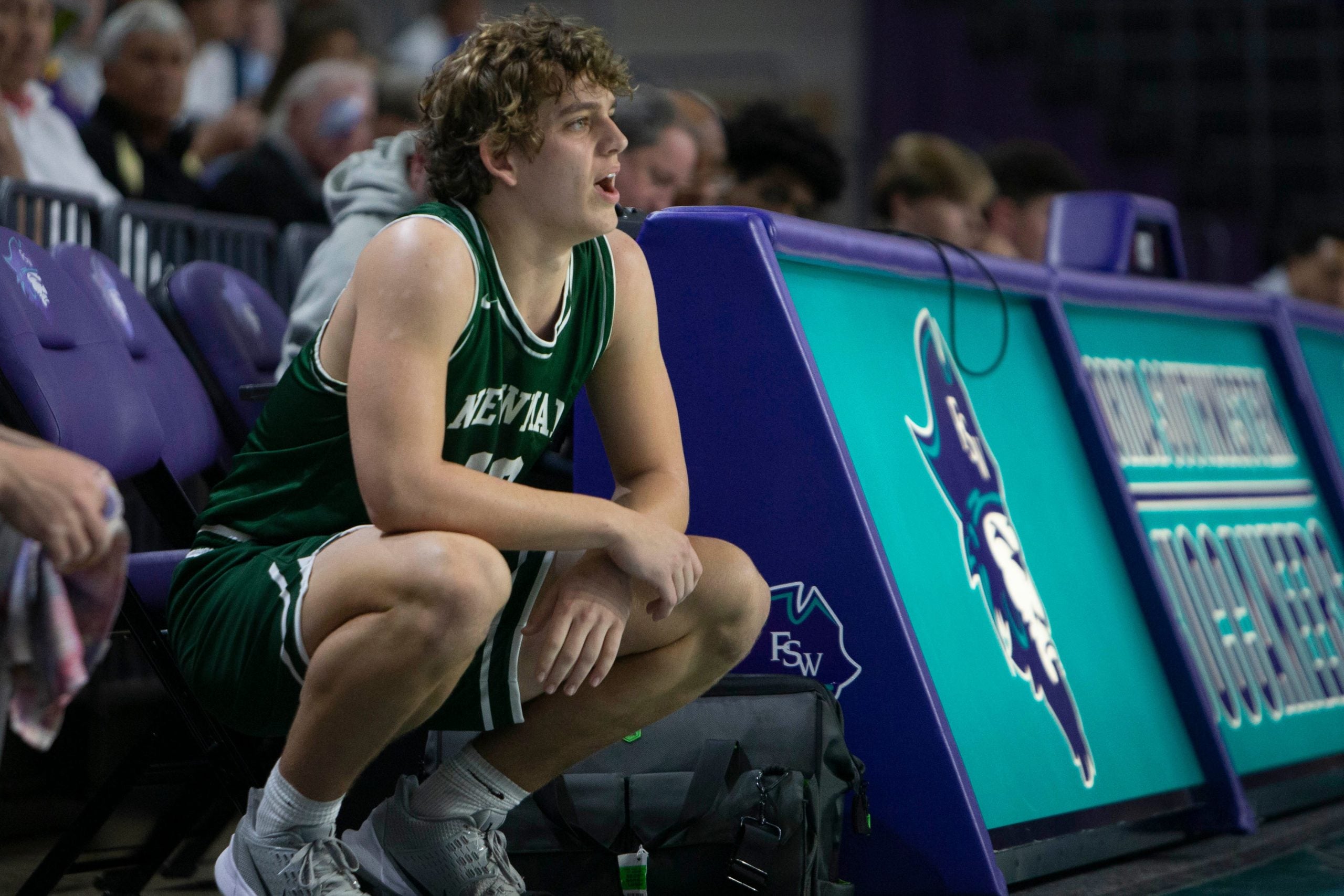 Isidore Newman's Arch Manning (10) checks into the game during the first half of the 2021 City of Palms Classic game between Oak Hill Academy and Isidore Newman, Saturday, Dec. 18, 2021, at Suncoast Credit Union Arena in Fort Myers, Fla.Oak Hill Academy led Isidore Newman 30-20 at halftime. City of Palms Classic: Oak Hill Academy vs. Isidore Newman