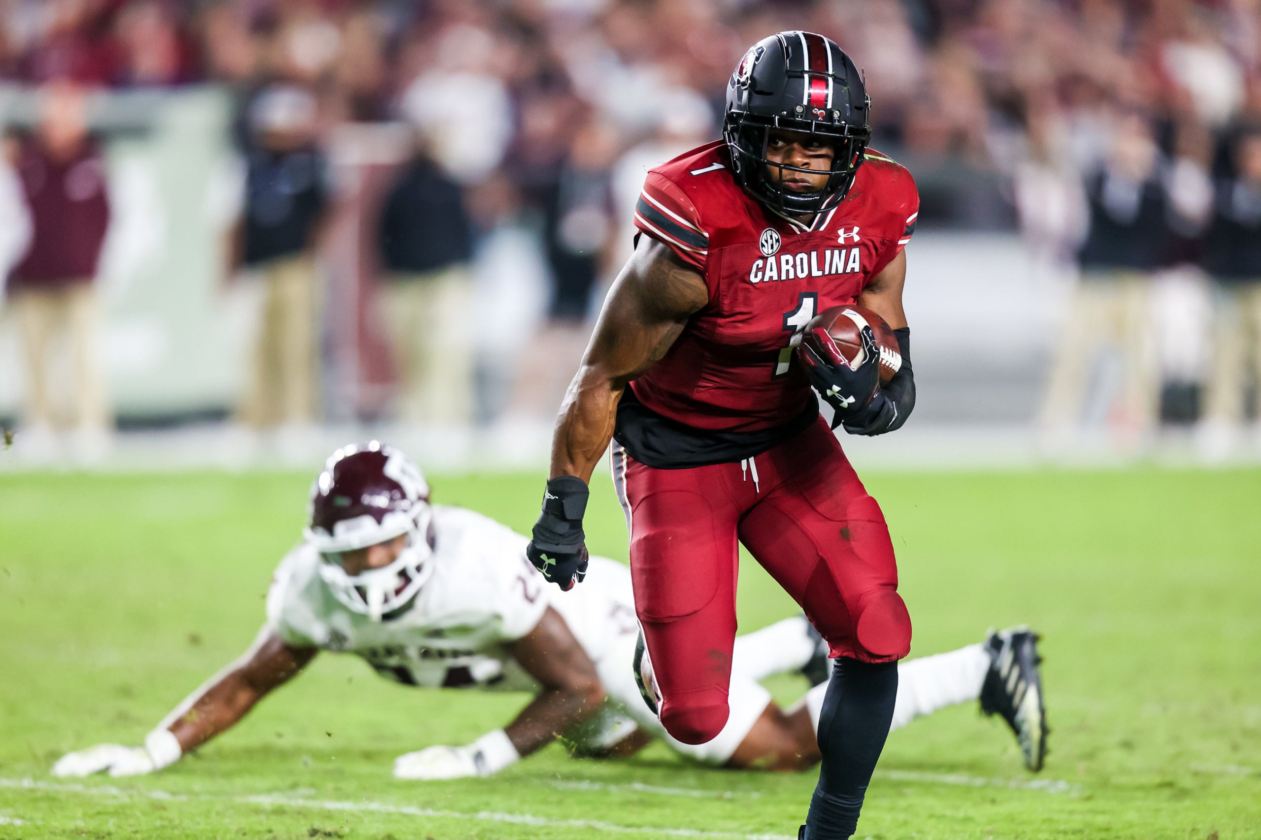 Oct 22, 2022; Columbia, South Carolina, USA; South Carolina Gamecocks running back MarShawn Lloyd (1) rushes for a touchdown against the Texas A&M Aggies in the second half at Williams-Brice Stadium. Mandatory Credit: Jeff Blake-USA TODAY Sports