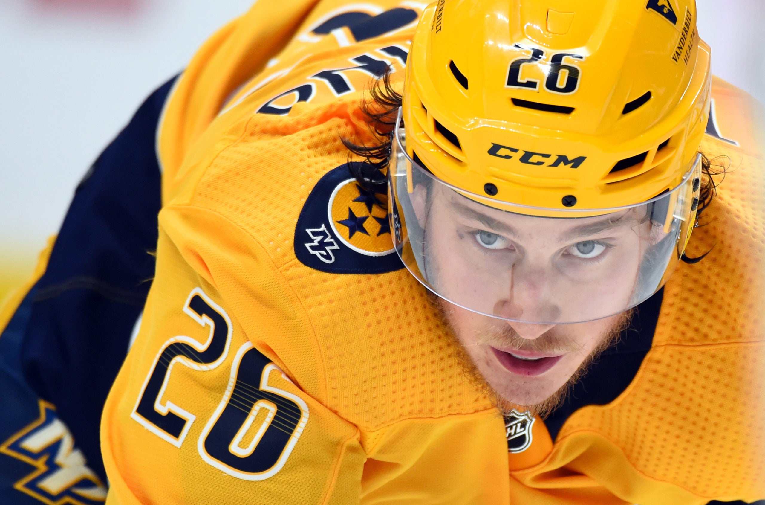 Philip Tomasino of the Nashville Predators awaits a faceoff