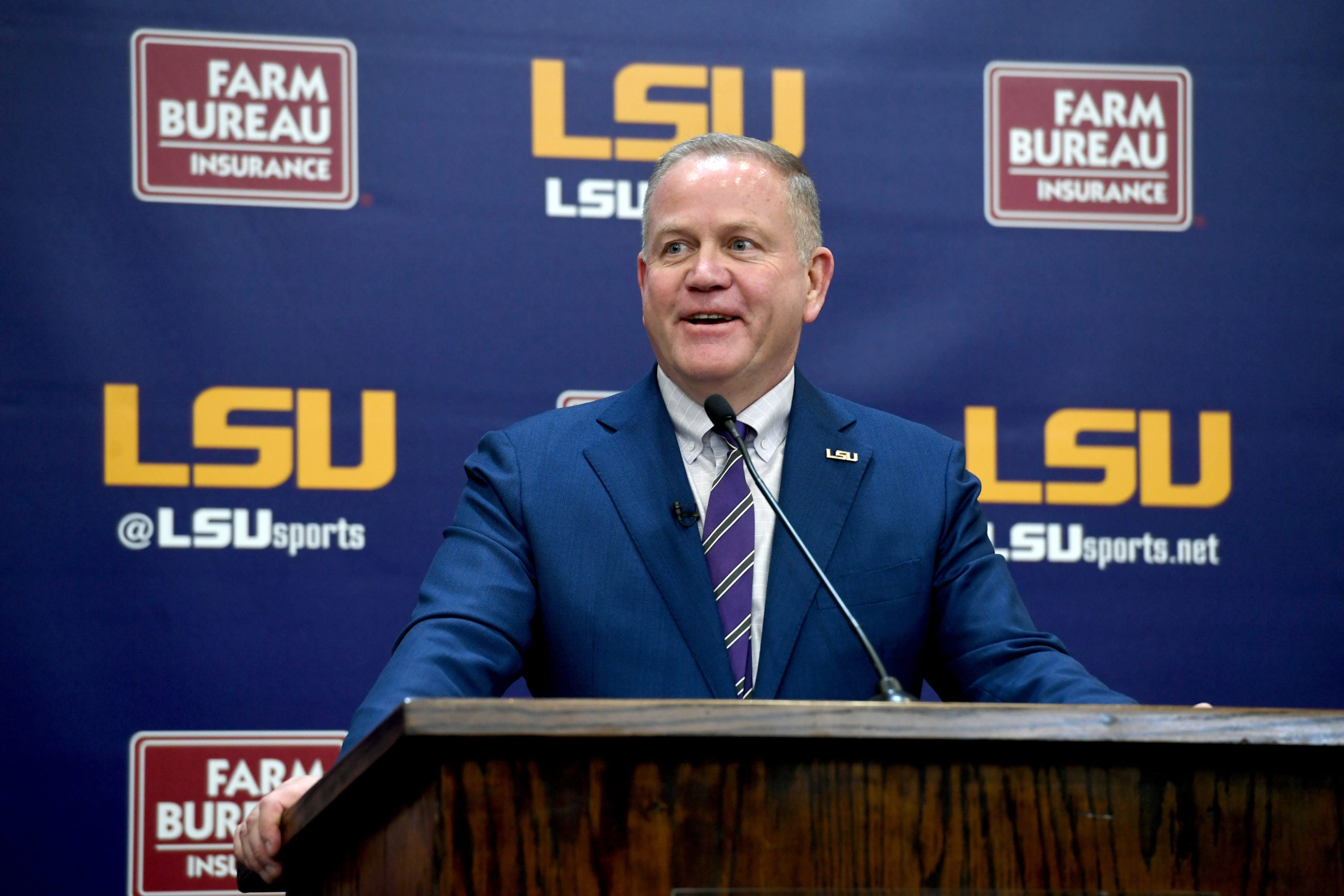 Dec 1, 2021; Baton Rouge, LA, USA; Newly named LSU Tigers head football coach Brian Kelly answers media questions after being introduced in a press conference at Tiger Stadium. Mandatory Credit: Patrick Dennis-USA TODAY Sports