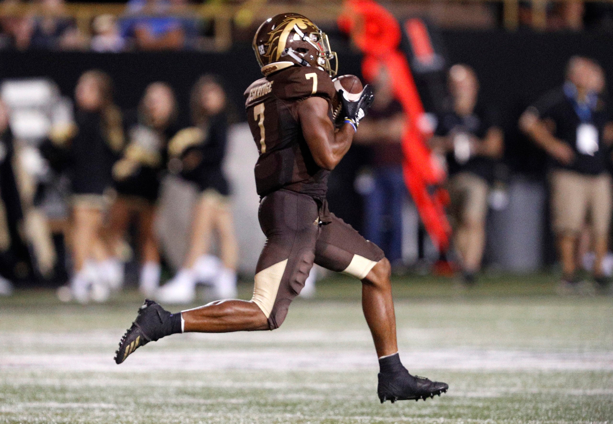 Aug 31, 2018; Kalamazoo, MI, USA; Western Michigan Broncos wide receiver D'Wayne Eskridge (7) catches the ball and runs for a touchdown during the third quarter against the Syracuse Orange at Waldo Stadium. Mandatory Credit: Raj Mehta-USA TODAY Sports