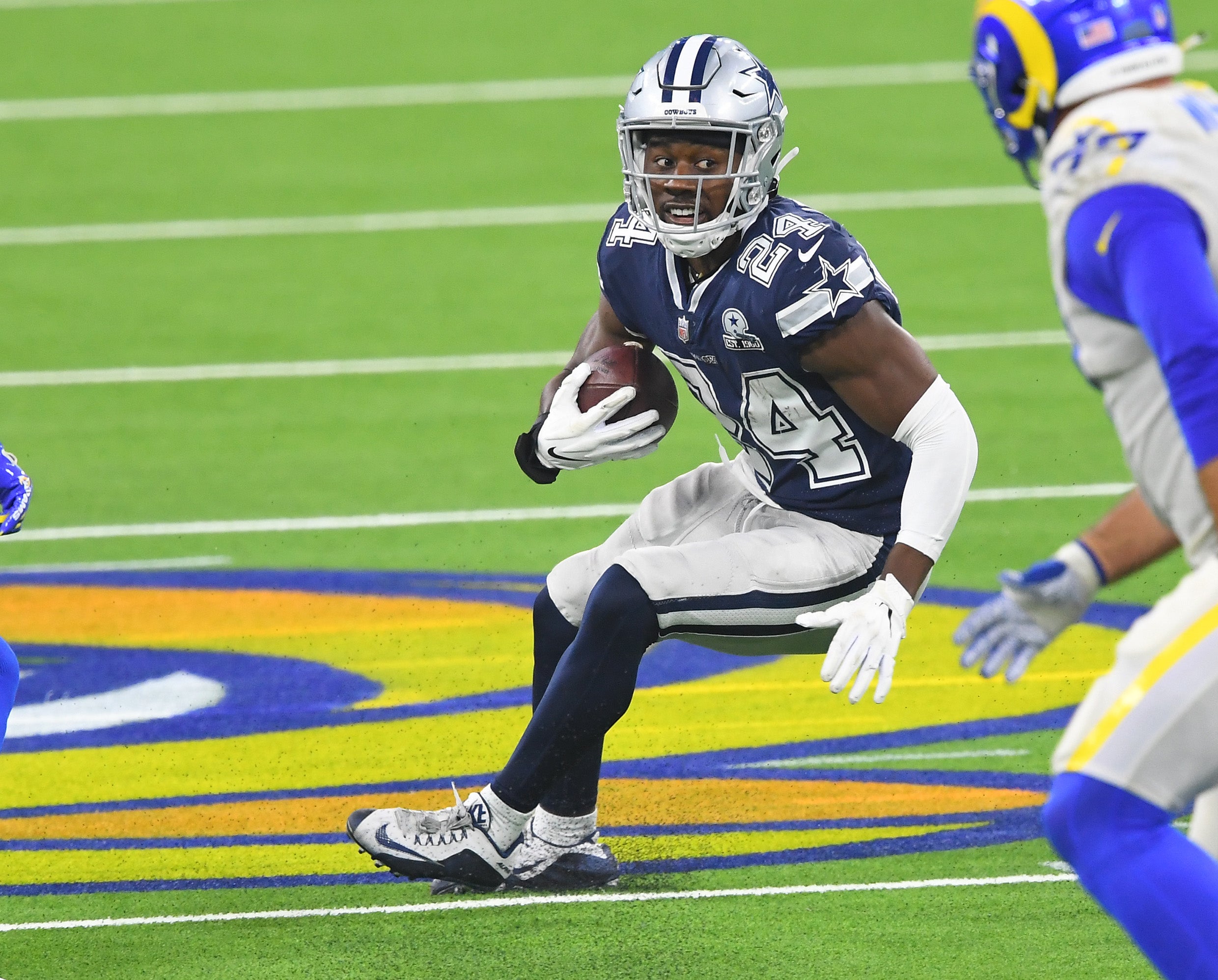Sep 13, 2020; Inglewood, California, USA; Dallas Cowboys cornerback Chidobe Awuzie (24) hangs on to the ball after he intercepted a pass intended for Los Angeles Rams wide receiver Van Jefferson (12) in the second half of the game at SoFi Stadium. Mandatory Credit: Jayne Kamin-Oncea-USA TODAY Sports