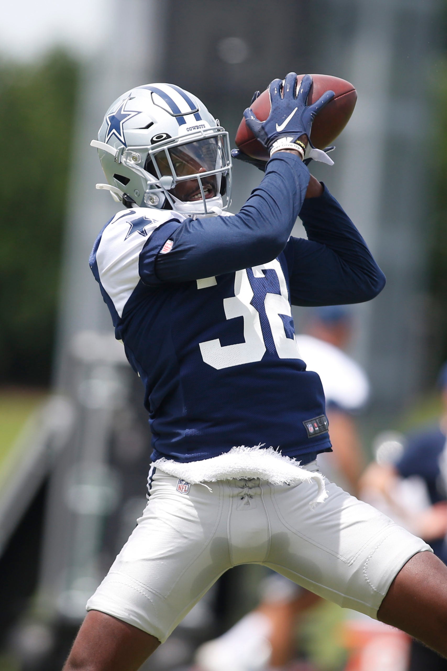 Jun 3, 2021; Frisco, TX, USA; Dallas Cowboys safety Jayron Kearse (32) going through drills during voluntary Organized Team Activities at the Star Training Facility in Frisco, Texas. Mandatory Credit: Tim Heitman-USA TODAY Sports