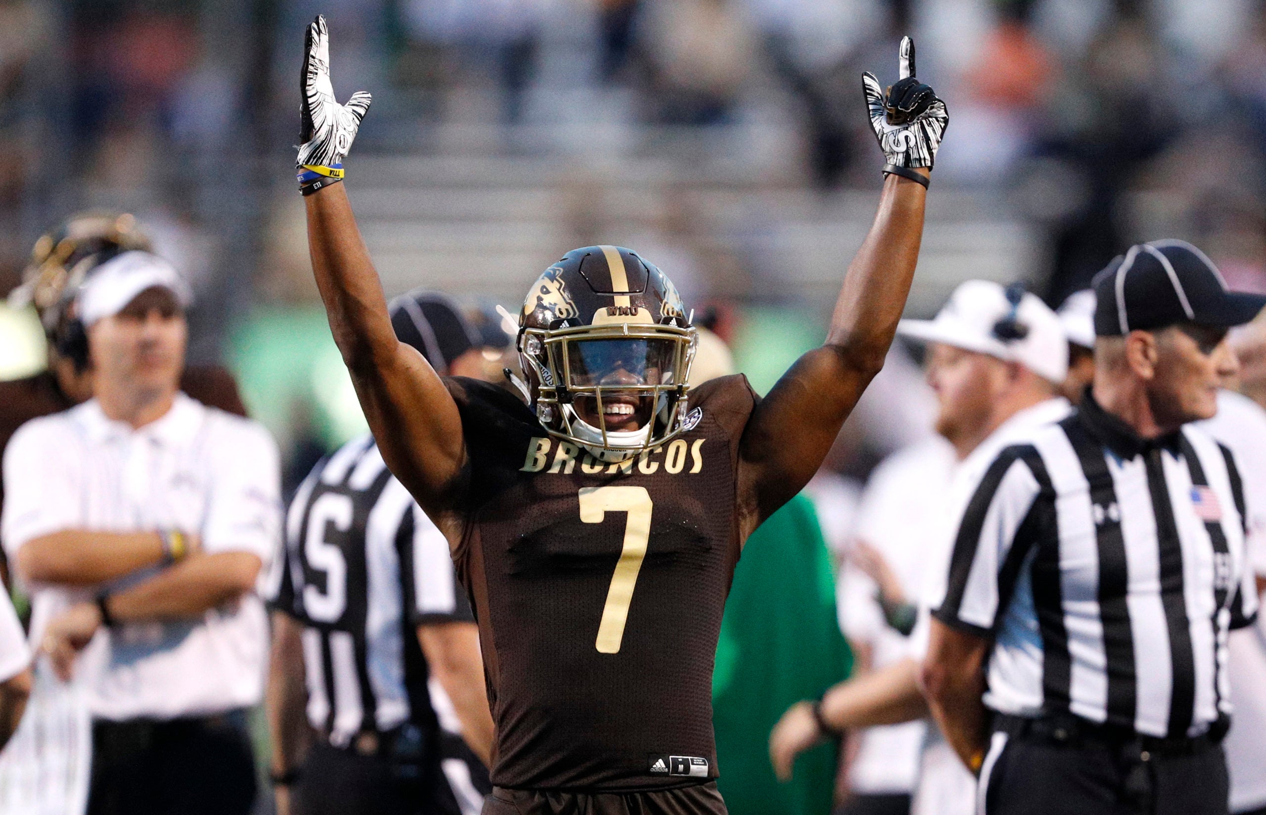 Aug 31, 2018; Kalamazoo, MI, USA; Western Michigan Broncos wide receiver D'Wayne Eskridge (7) celebrates after official review confirms his touchdown during the third quarter against the Syracuse Orange at Waldo Stadium. Mandatory Credit: Raj Mehta-USA TODAY Sports