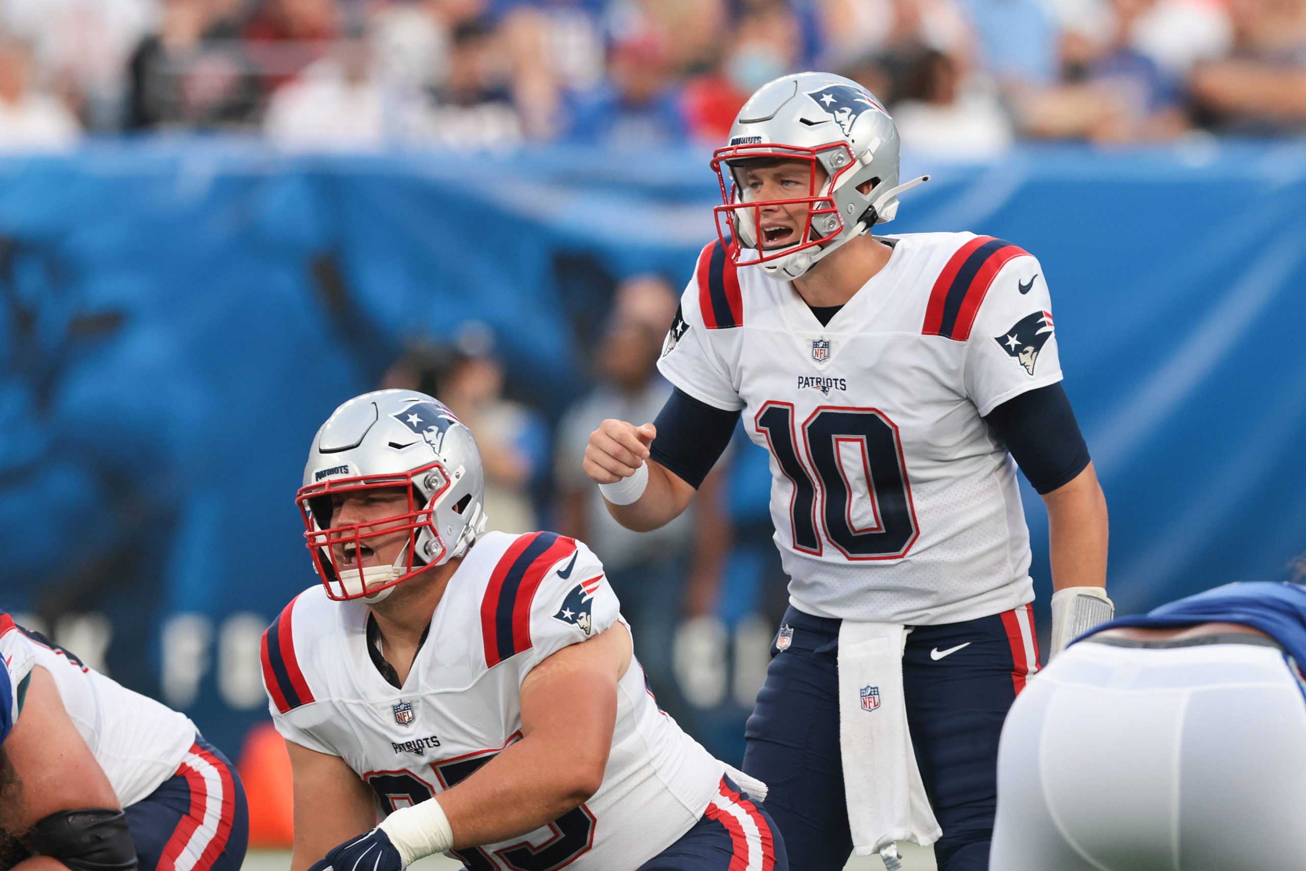 Aug 29, 2021; East Rutherford, New Jersey, USA; New England Patriots quarterback Mac Jones (10) signals during the first half against the New York Giants at MetLife Stadium. Mandatory Credit: Vincent Carchietta-USA TODAY Sports