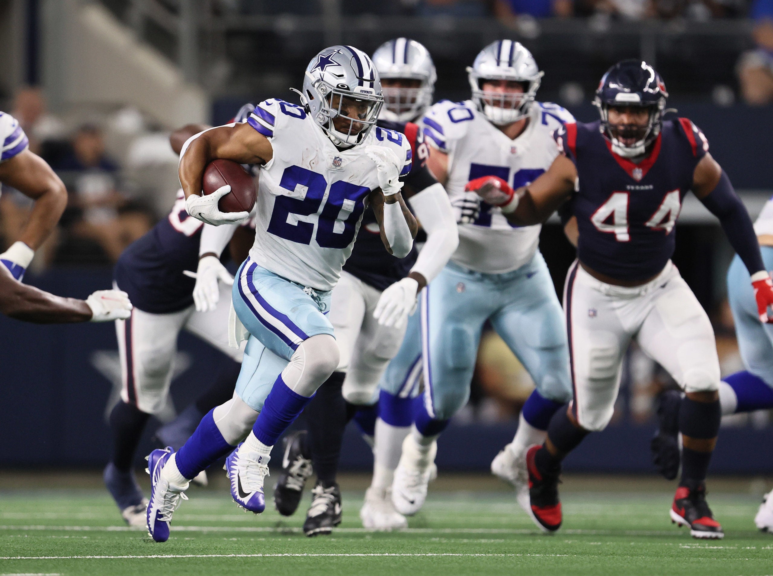 Aug 21, 2021; Arlington, Texas, USA; Dallas Cowboys running back Tony Pollard (20) runs with the ball in the first quarter against the Houston Texans at AT&T Stadium. Mandatory Credit: Matthew Emmons-USA TODAY Sports