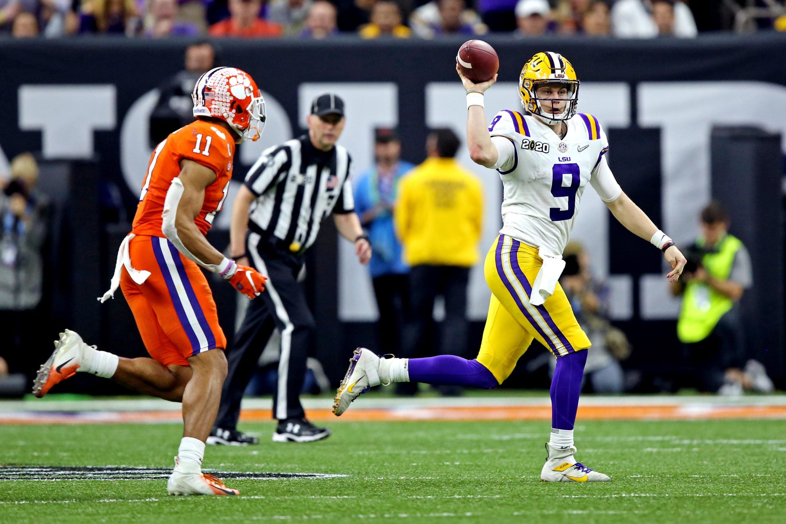 Jan 13, 2020; New Orleans, Louisiana, USA; LSU Tigers quarterback Joe Burrow (9) throws a pass against Clemson Tigers linebacker Isaiah Simmons (11) during the third quarter in the College Football Playoff national championship game at Mercedes-Benz Superdome. Mandatory Credit: Chuck Cook-USA TODAY Sports