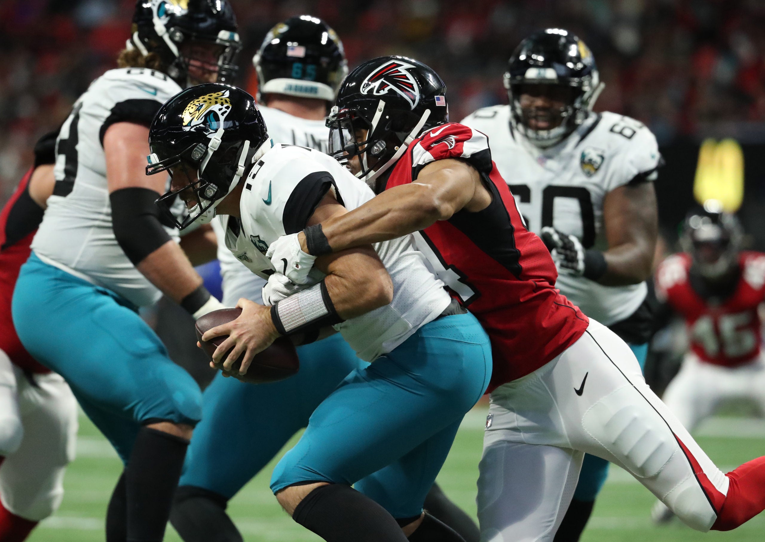 Dec 22, 2019; Atlanta, Georgia, USA; Atlanta Falcons linebacker Vic Beasley Jr. (44) sacks Jacksonville Jaguars quarterback Gardner Minshew II (15) in the second quarter at Mercedes-Benz Stadium. Mandatory Credit: Jason Getz-USA TODAY Sports