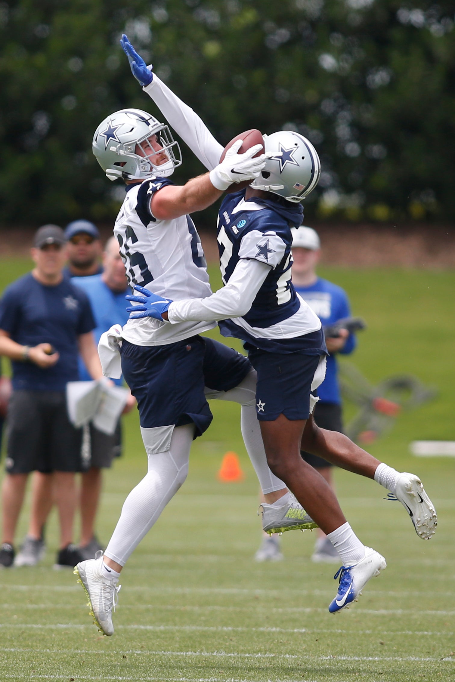 Jun 3, 2021; Frisco, TX, USA; Dallas Cowboys tight end Dalton Schultz (86) catches a pass against cornerback Trevon Diggs (27) during voluntary Organized Team Activities at the Star Training Facility in Frisco, Texas. Mandatory Credit: Tim Heitman-USA TODAY Sports