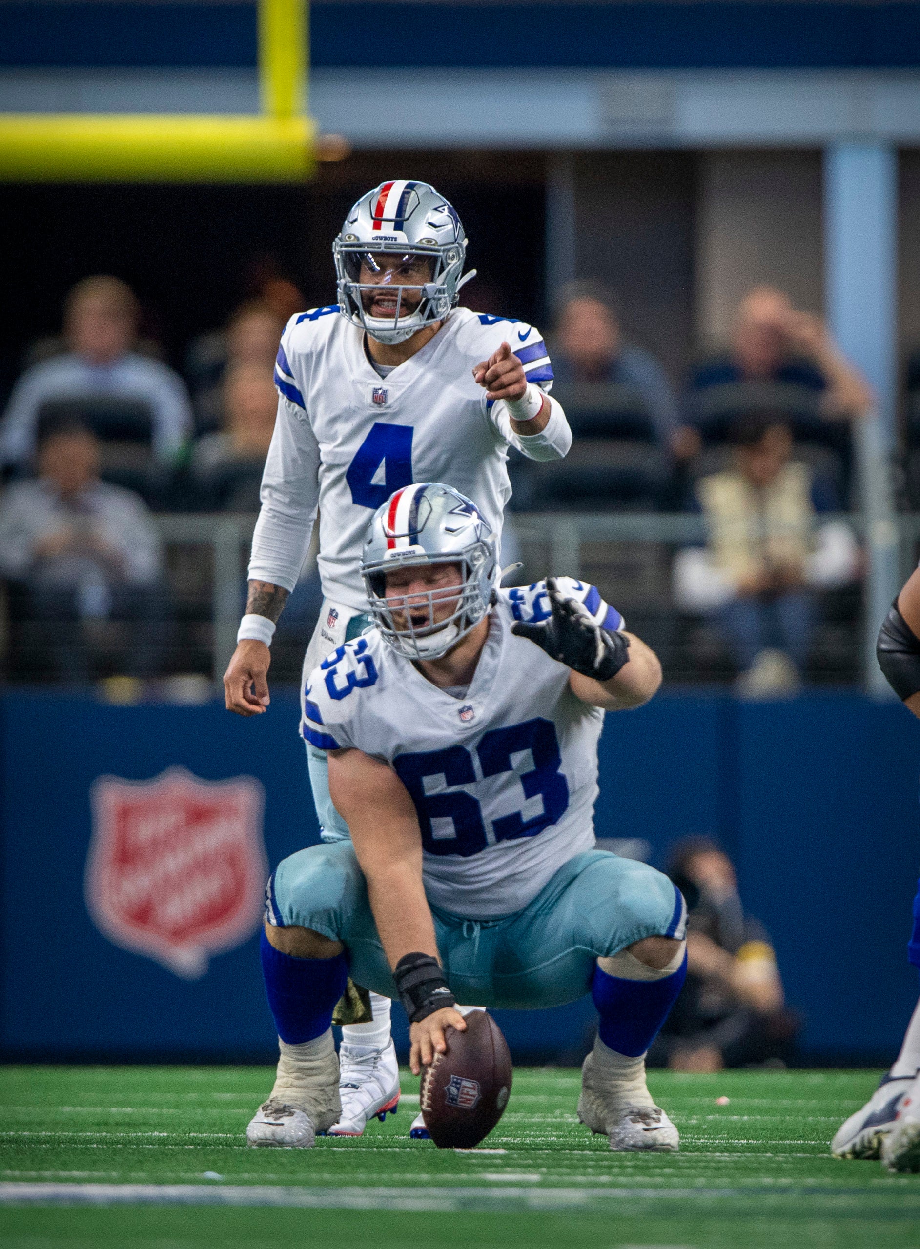 Nov 7, 2021; Arlington, Texas, USA; Dallas Cowboys quarterback Dak Prescott (4) and center Tyler Biadasz (63) in action during the game between the Dallas Cowboys and the Denver Broncos at AT&T Stadium. Mandatory Credit: Jerome Miron-USA TODAY Sports