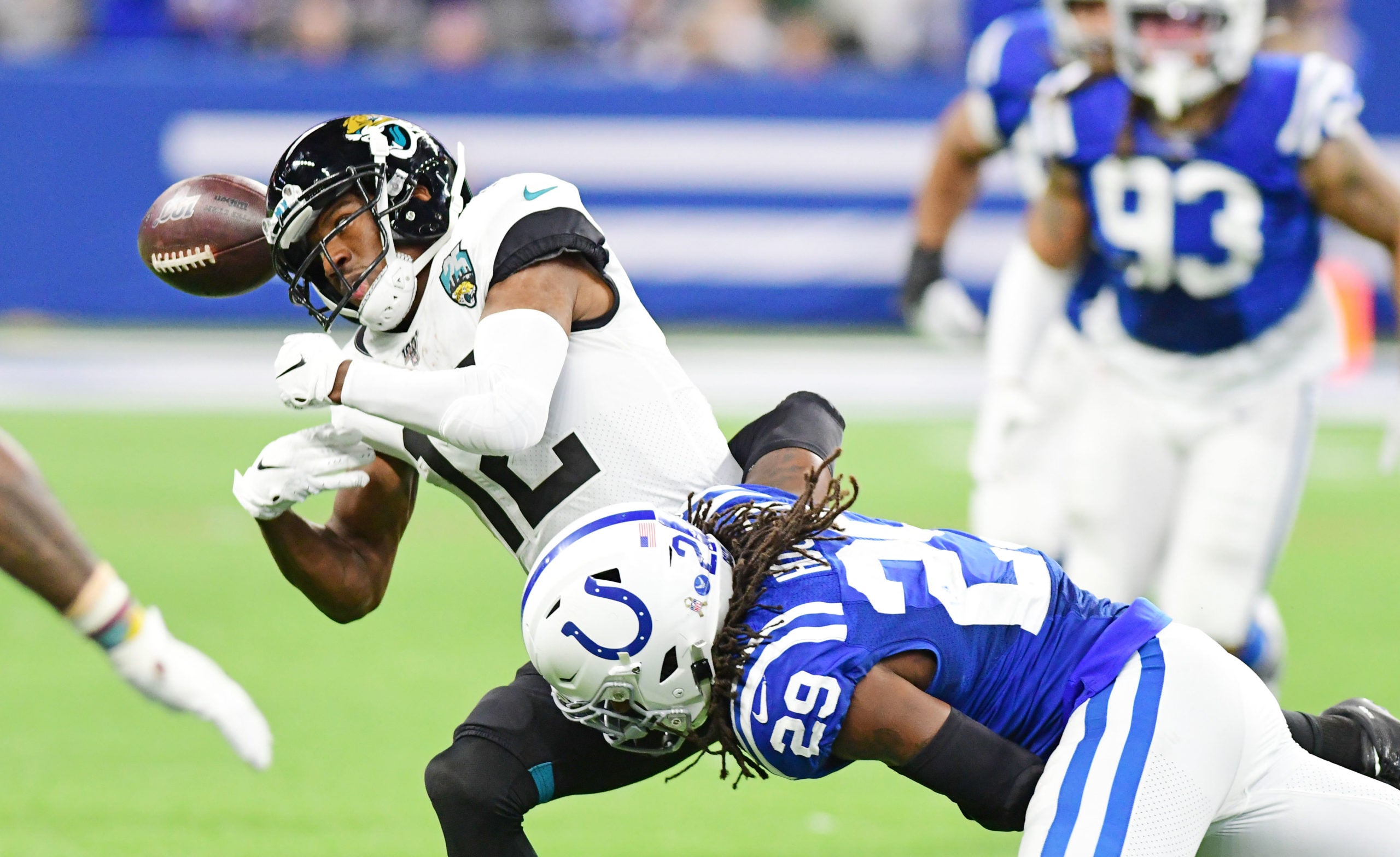 Nov 17, 2019; Indianapolis, IN, USA; Jacksonville Jaguars receiver Dede Westbrook (12) drops a pass after being hit by Indianapolis Colts safety Malik Hooker (29) in the second half  at Lucas Oil Stadium. Mandatory Credit: Thomas J. Russo-USA TODAY Sports