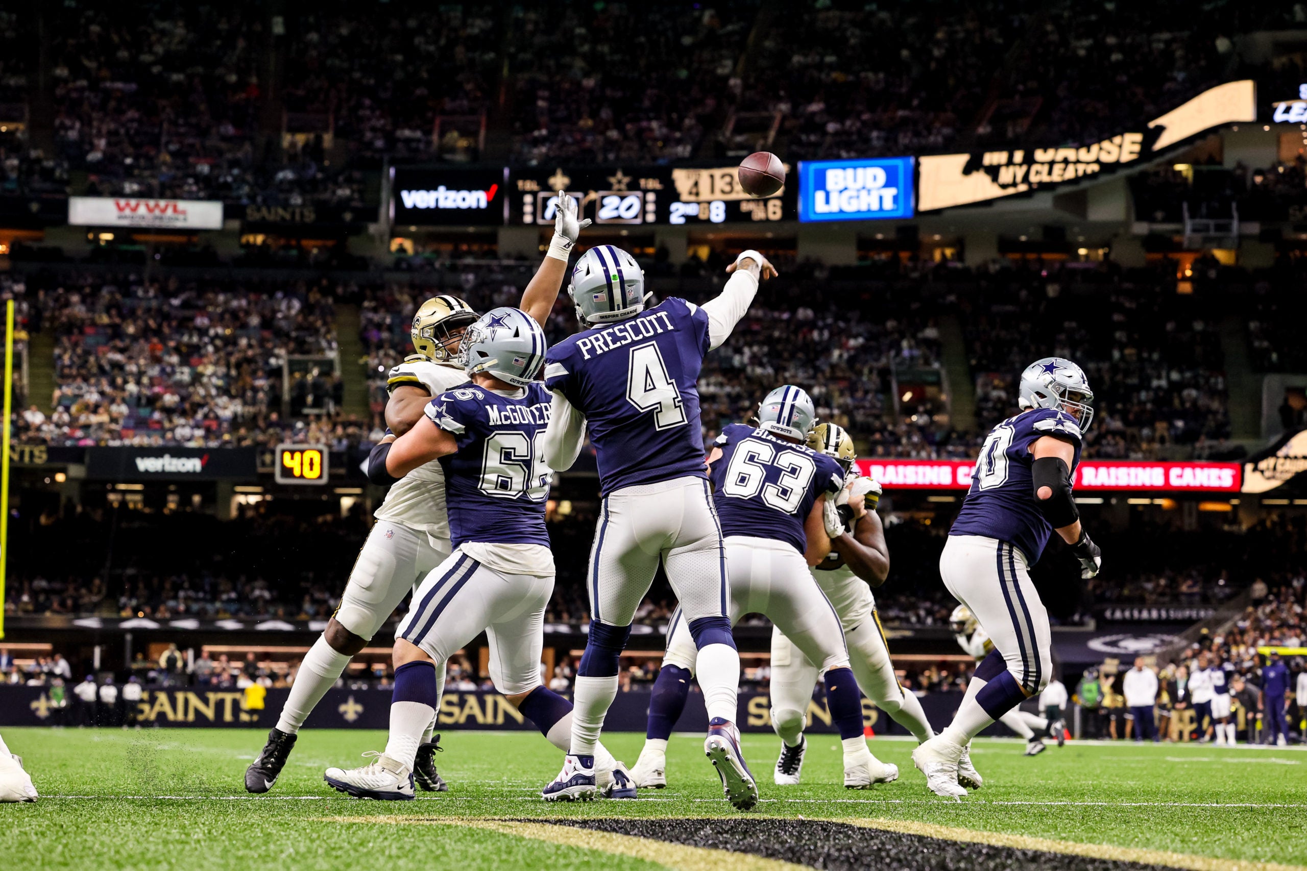 Dec 2, 2021; New Orleans, Louisiana, USA; Dallas Cowboys quarterback Dak Prescott (4) passes the ball against New Orleans Saints during the second half at Caesars Superdome. Mandatory Credit: Stephen Lew-USA TODAY Sports