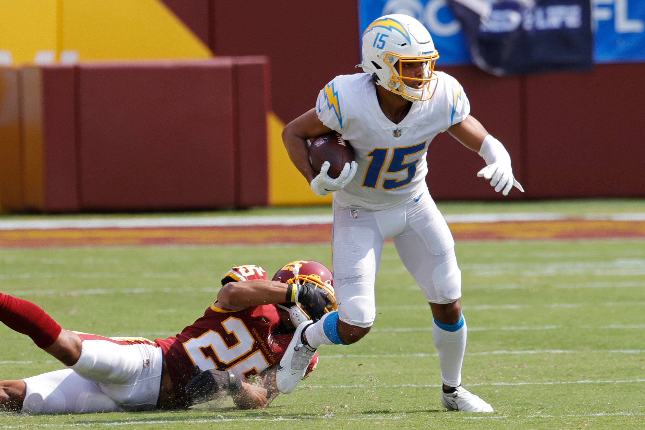 Sep 12, 2021; Landover, Maryland, USA; Los Angeles Chargers wide receiver Jalen Guyton (15) runs with the ball against the Washington Football Teamat FedExField. Mandatory Credit: Geoff Burke-USA TODAY Sports