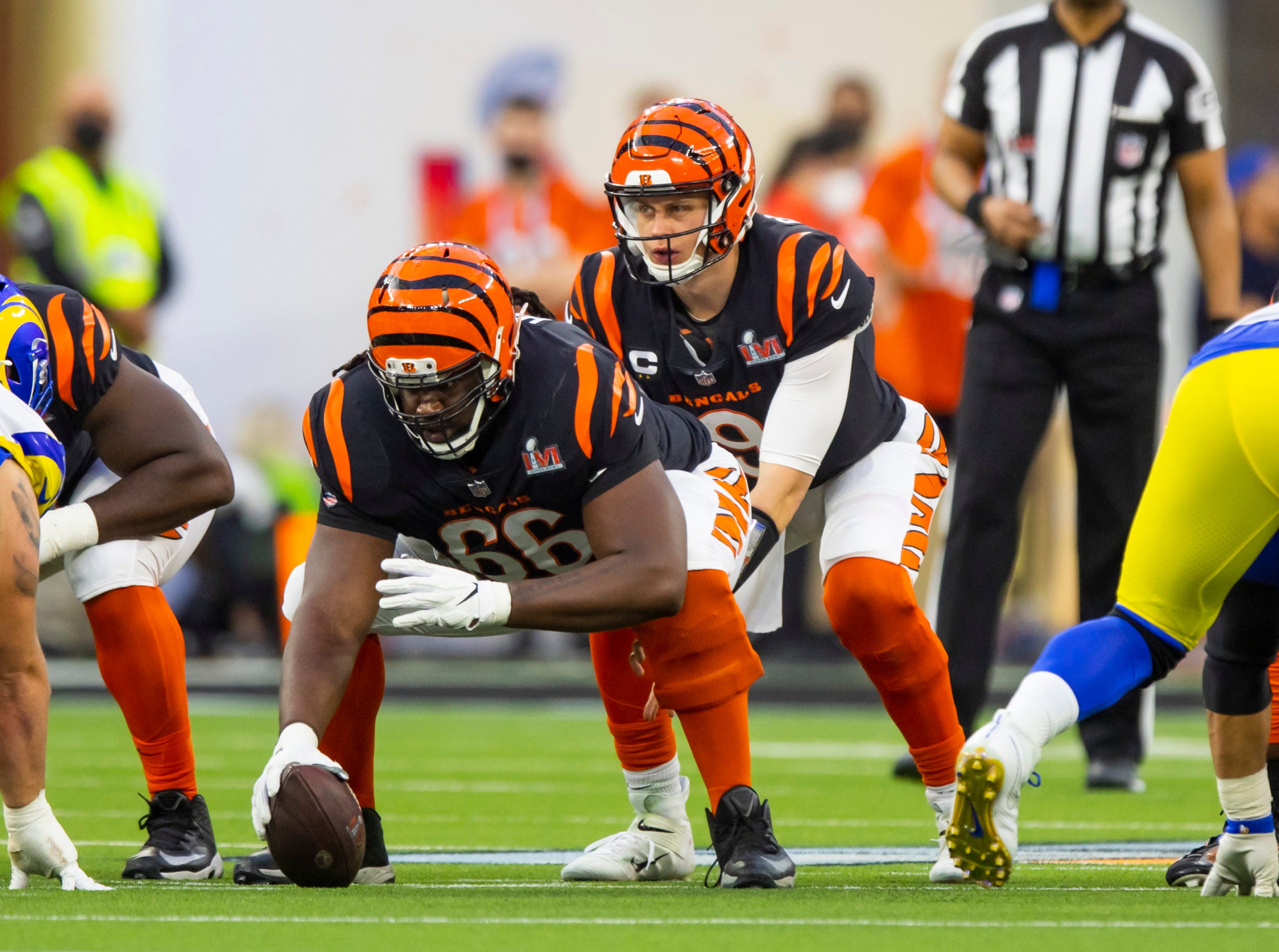 Feb 13, 2022; Inglewood, CA, USA; Cincinnati Bengals center Trey Hopkins (66) prepares to snap the ball to quarterback Joe Burrow (9) against the Los Angeles Rams during Super Bowl LVI at SoFi Stadium. Mandatory Credit: Mark J. Rebilas-USA TODAY Sports