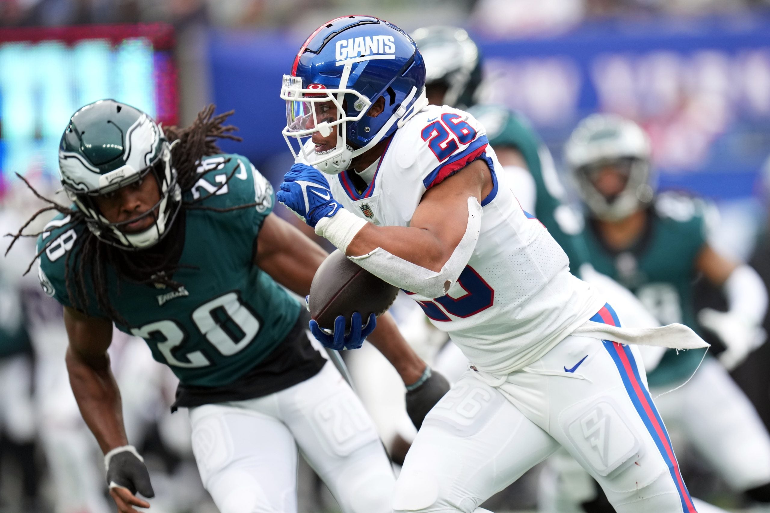 New York Giants running back Saquon Barkley (26) rushes against the Philadelphia Eagles in the first half. The Giants defeat the Eagles, 13-7, at MetLife Stadium on Sunday, Nov. 28, 2021, in East Rutherford. Nyg Vs Phi