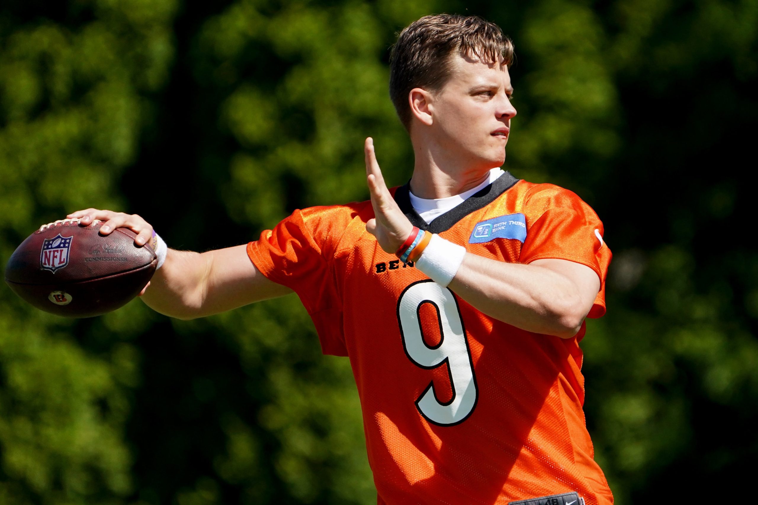 Cincinnati Bengals quarterback Joe Burrow (9) throws during practice, Tuesday, May 17, 2022, at the Paul Brown Stadium practice fields in Cincinnati. Cincinnati Bengals Practice May 17 0082