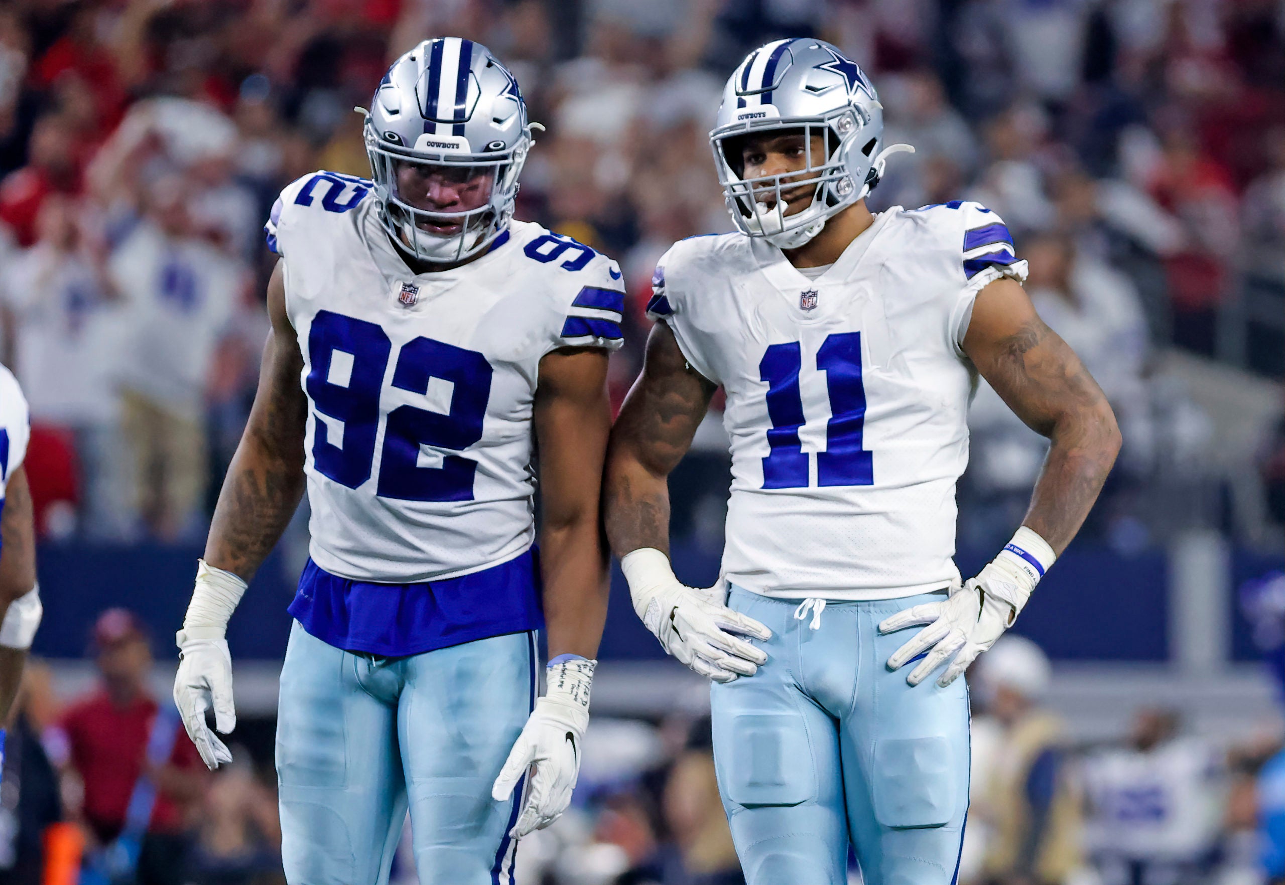 Jan 16, 2022; Arlington, Texas, USA; Dallas Cowboys defensive end Dorance Armstrong (92) and outside linebacker Micah Parsons (11) in action during the NFC Wild Card playoff football game against the San Francisco 49ers at AT&T Stadium. Mandatory Credit: Kevin Jairaj-USA TODAY Sports