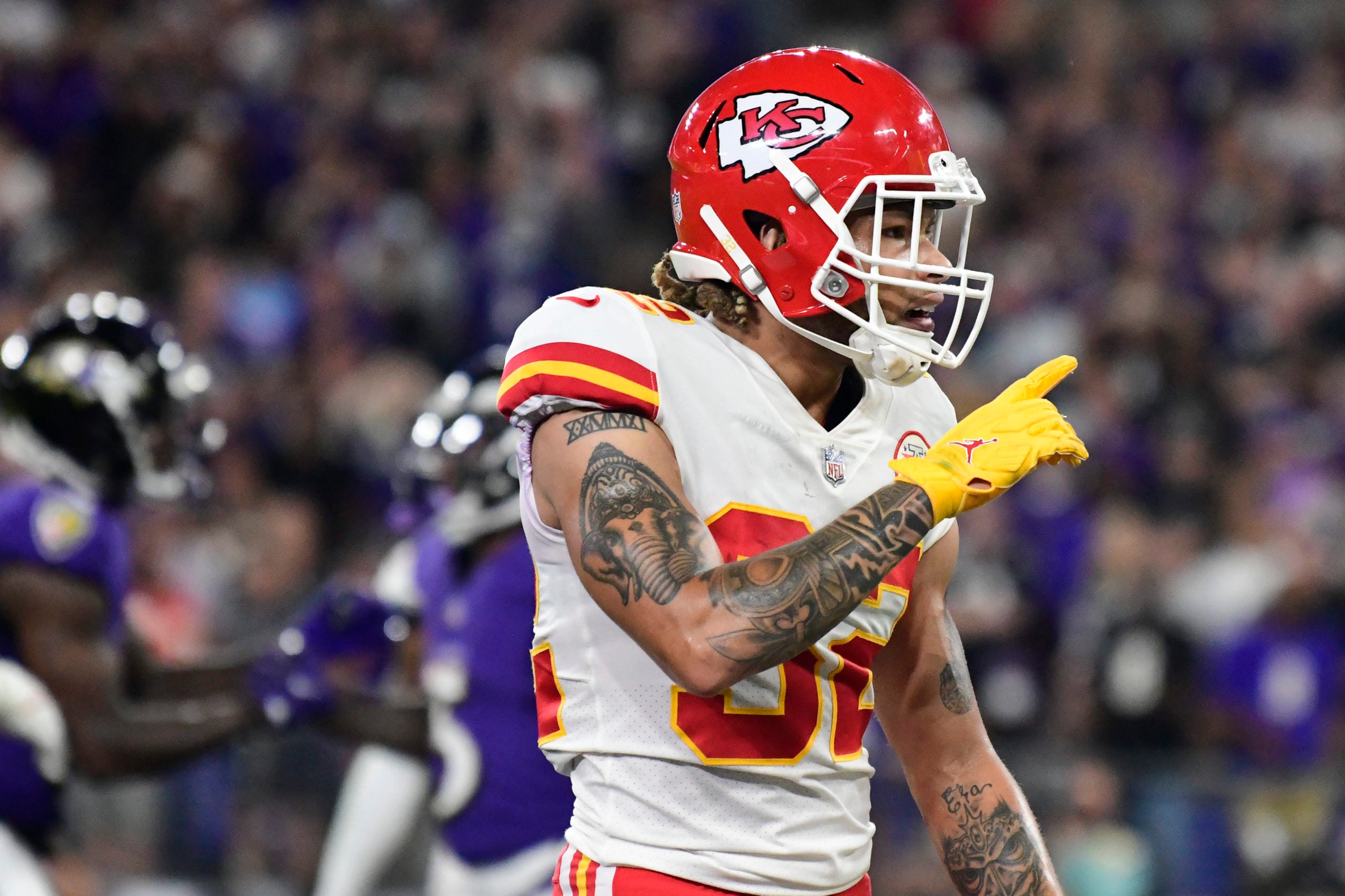 Sep 19, 2021; Baltimore, Maryland, USA;  Kansas City Chiefs safety Tyrann Mathieu (32) signals to the stands during the fourth quarter against the Baltimore Ravens at M&T Bank Stadium. Mandatory Credit: Tommy Gilligan-USA TODAY Sports