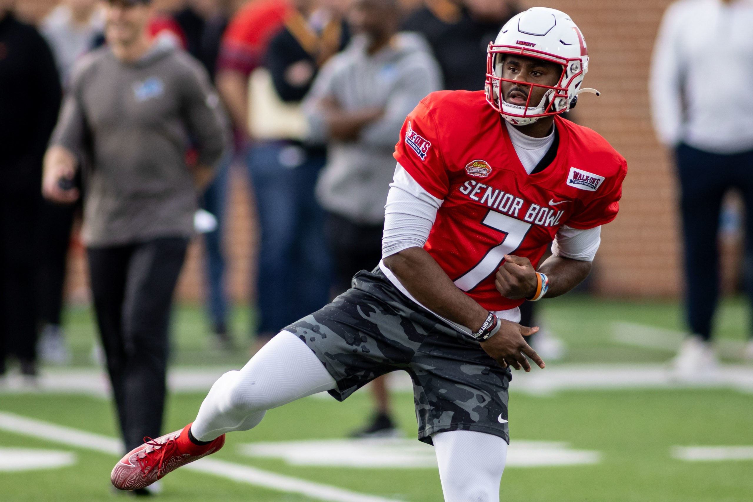 Feb 1, 2022; Mobile, AL, USA; American quarterback Malik Willis of Liberty (7) throws during American practice for the 2022 Senior Bowl at Hancock Whitney Stadium. Mandatory Credit: Vasha Hunt-USA TODAY Sports