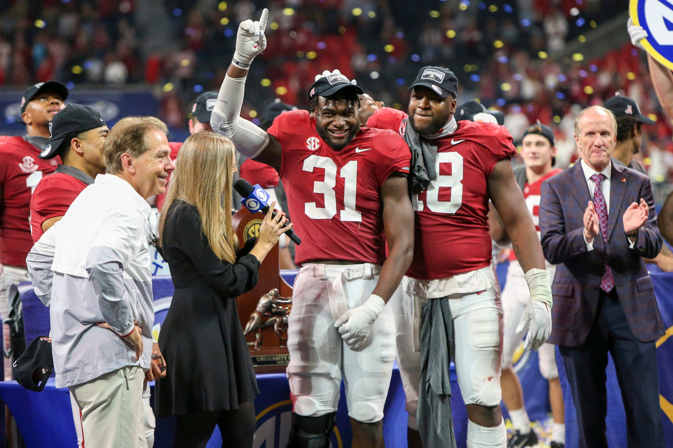 Dec 4, 2021; Atlanta, GA, USA; Alabama Crimson Tide linebacker Will Anderson Jr. (31) and defensive lineman Phidarian Mathis (48) celebrate after a victory against the Georgia Bulldogs in the SEC championship game at Mercedes-Benz Stadium. Mandatory Credit: Brett Davis-USA TODAY Sports