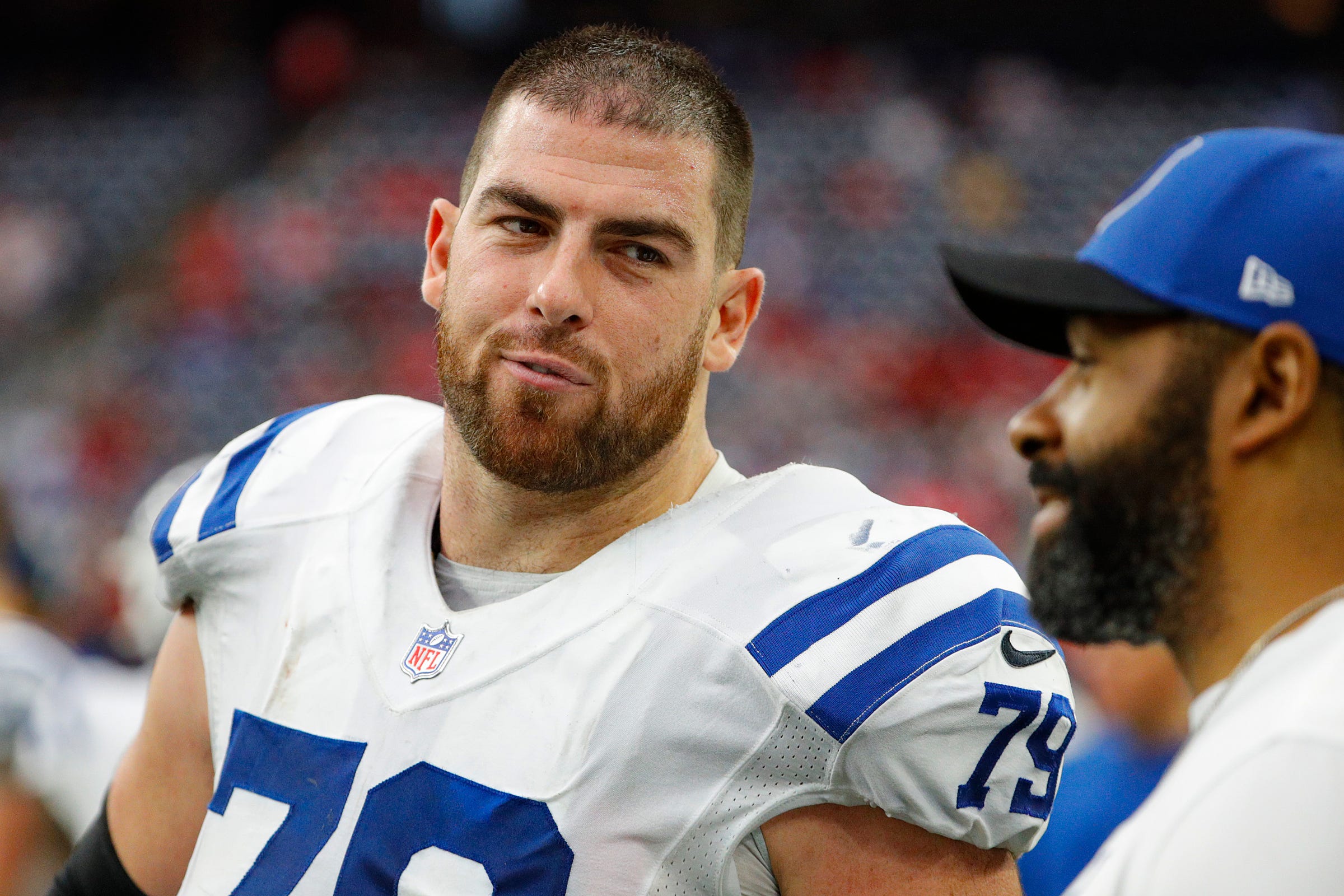 Indianapolis Colts offensive tackle Eric Fisher (79) rests on the sidelines late in the fourth quarter of the game Sunday, Dec. 5, 2021, at NRG Stadium in Houston. The Colts won, 31-0. Indianapolis Colts Versus Houston Texans On Sunday Dec 5 2021 At Nrg Stadium In Houston Texas