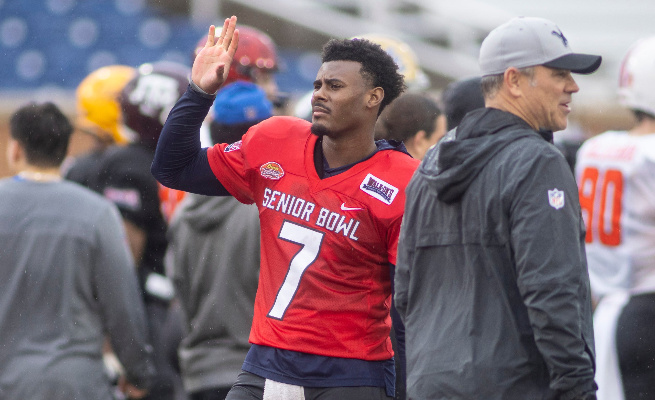 Feb 2, 2022; Mobile, AL, USA;  American quarterback Malik Willis of Liberty (7) waves for a football during American practice for the 2022 Senior Bowl in Mobile, AL, USA. Mandatory Credit: Vasha Hunt-USA TODAY Sports