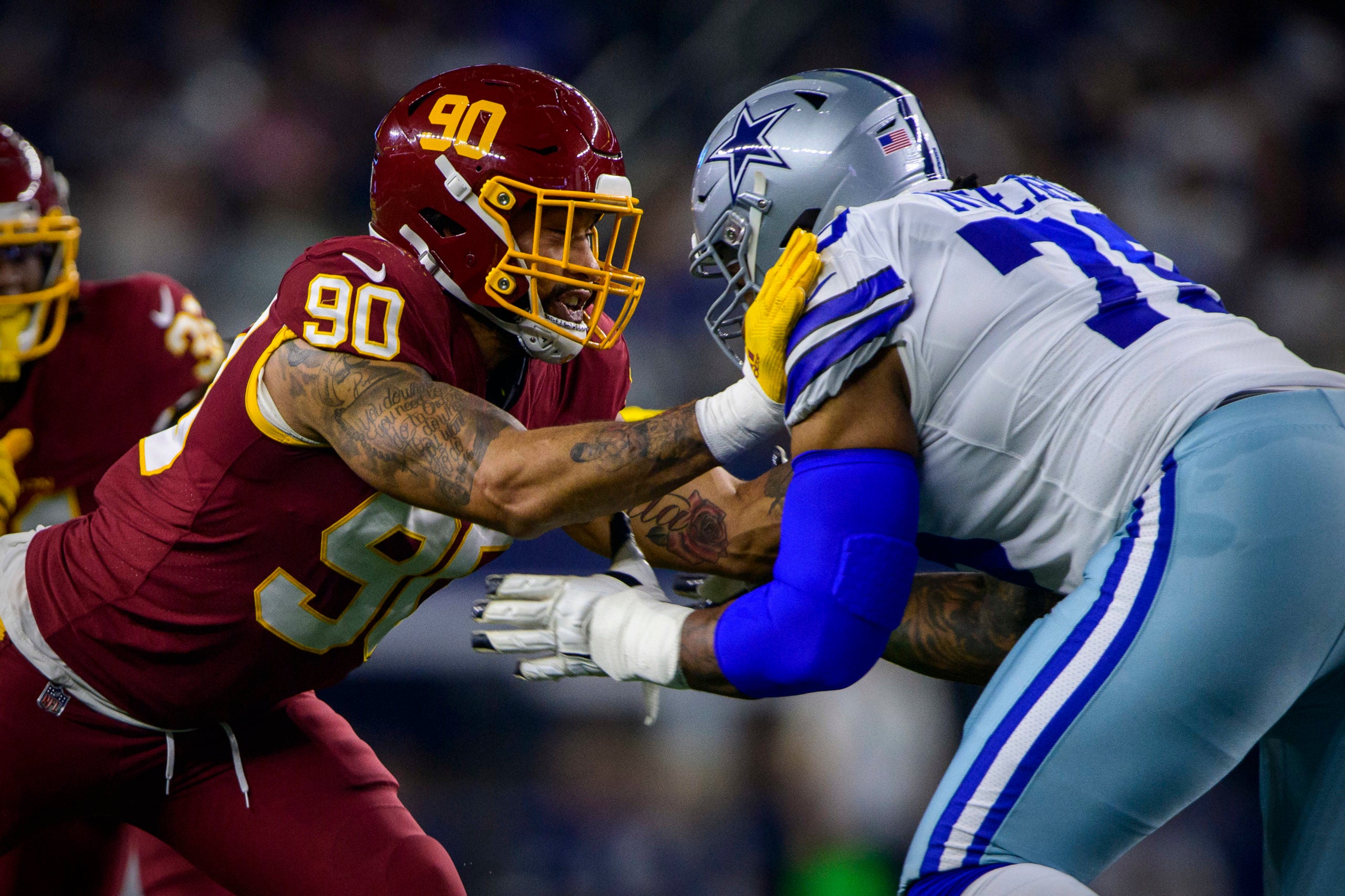 Dec 26, 2021; Arlington, Texas, USA; Dallas Cowboys offensive tackle Ty Nsekhe (79) blocks Washington Football Team defensive end Montez Sweat (90) during the first quarter at AT&T Stadium. Mandatory Credit: Jerome Miron-USA TODAY Sports