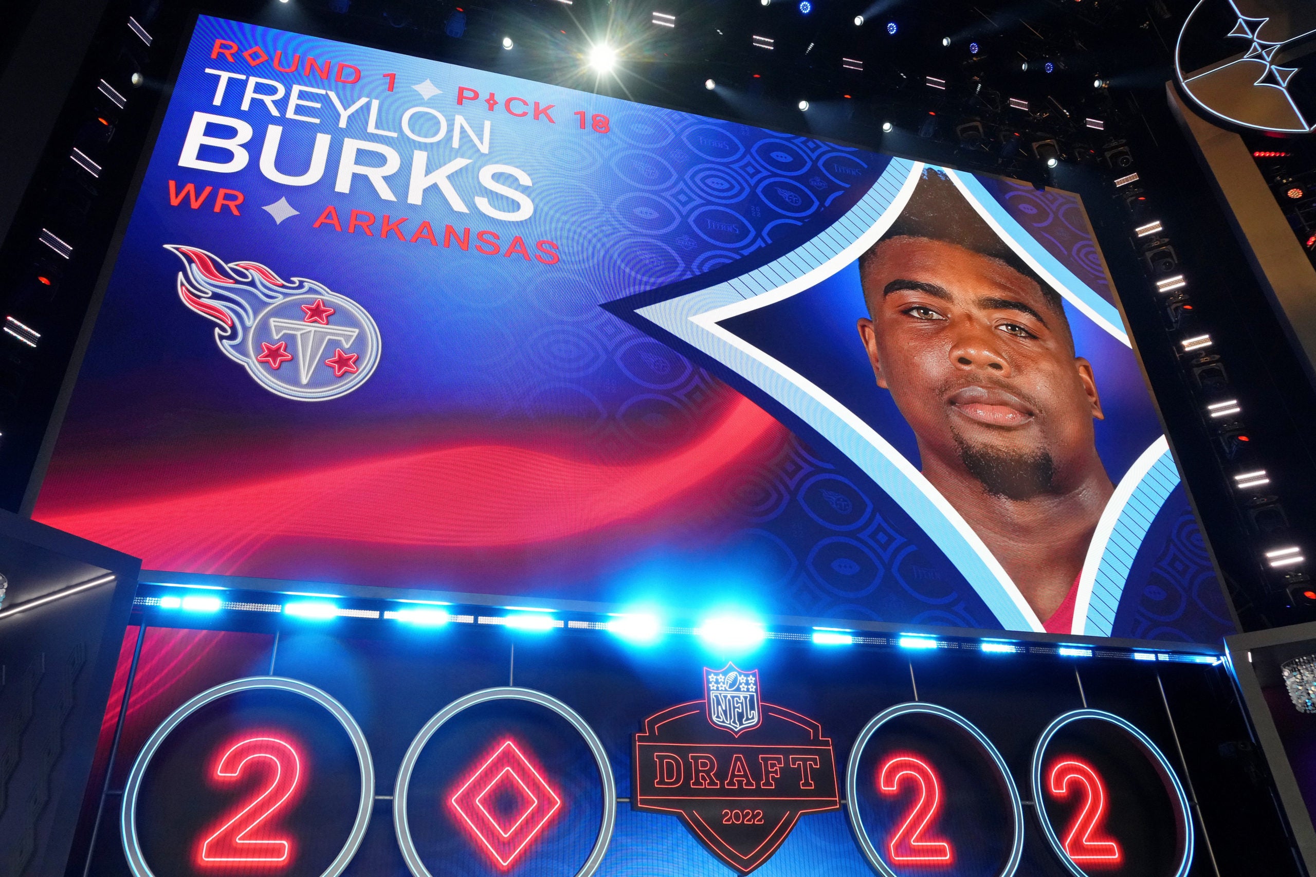 Apr 28, 2022; Las Vegas, NV, USA; Arkansas wide receiver Treylon Burks is announced as the eighteenth overall pick to the Tennessee Titans during the first round of the 2022 NFL Draft at the NFL Draft Theater. Mandatory Credit: Kirby Lee-USA TODAY Sports