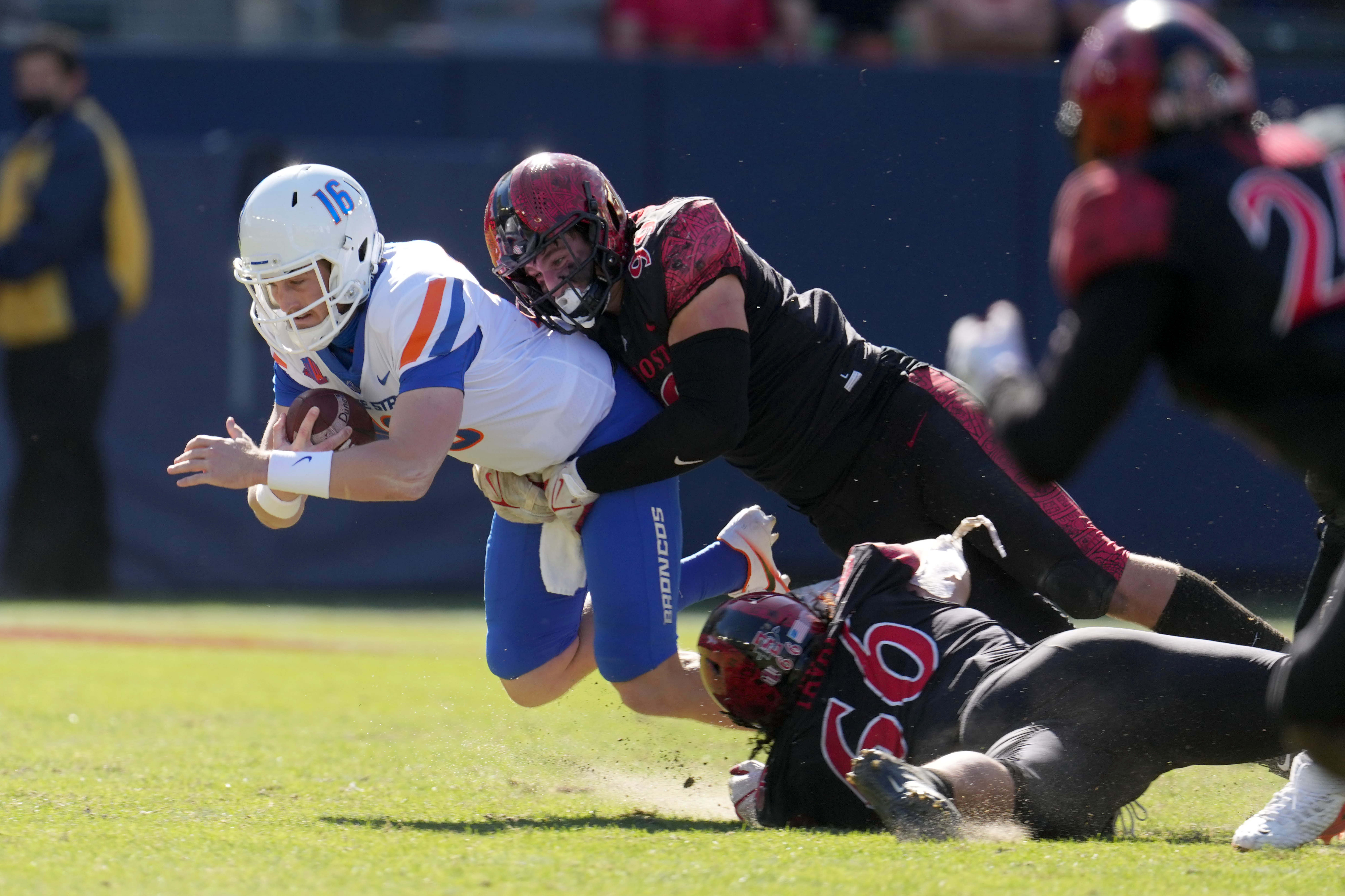 Nov 26, 2021; Carson, California, USA; San Diego State Aztecs defensive lineman Cameron Thomas (99) tackles Boise State Broncos quarterback Jack Sears (16)  in the second half at Dignity Health Sports Park. San Diego State defeated Boise State 27-16. Mandatory Credit: Kirby Lee-USA TODAY Sports