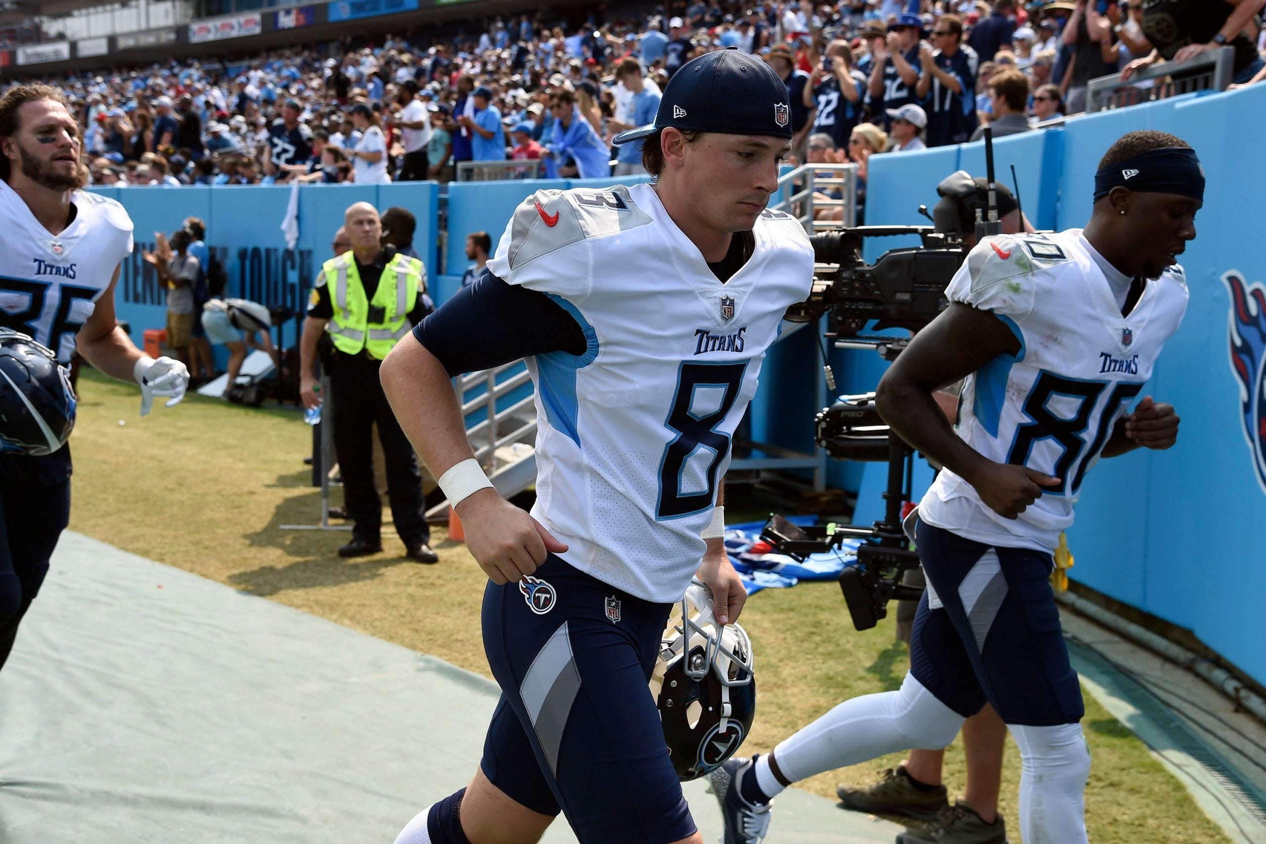 Tennessee Titans kicker Michael Badgley (8) and the team head to the locker room during halftime as the trail the Cardinals at Nissan Stadium Sunday, Sept. 12, 2021 in Nashville, Tenn. Titans Cards 156