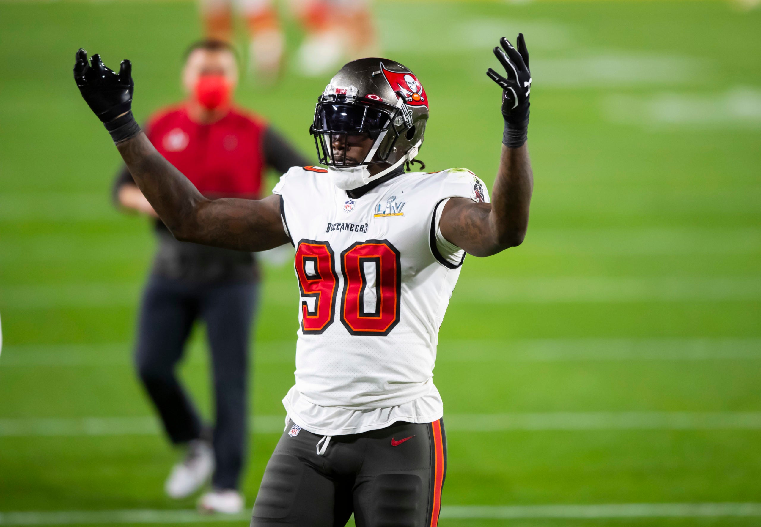 Feb 4, 2021; Tampa, FL, USA;  Tampa Bay Buccaneers linebacker Jason Pierre-Paul (90) reacts against the Kansas City Chiefs in Super Bowl LV at Raymond James Stadium.  Mandatory Credit: Mark J. Rebilas-USA TODAY Sports