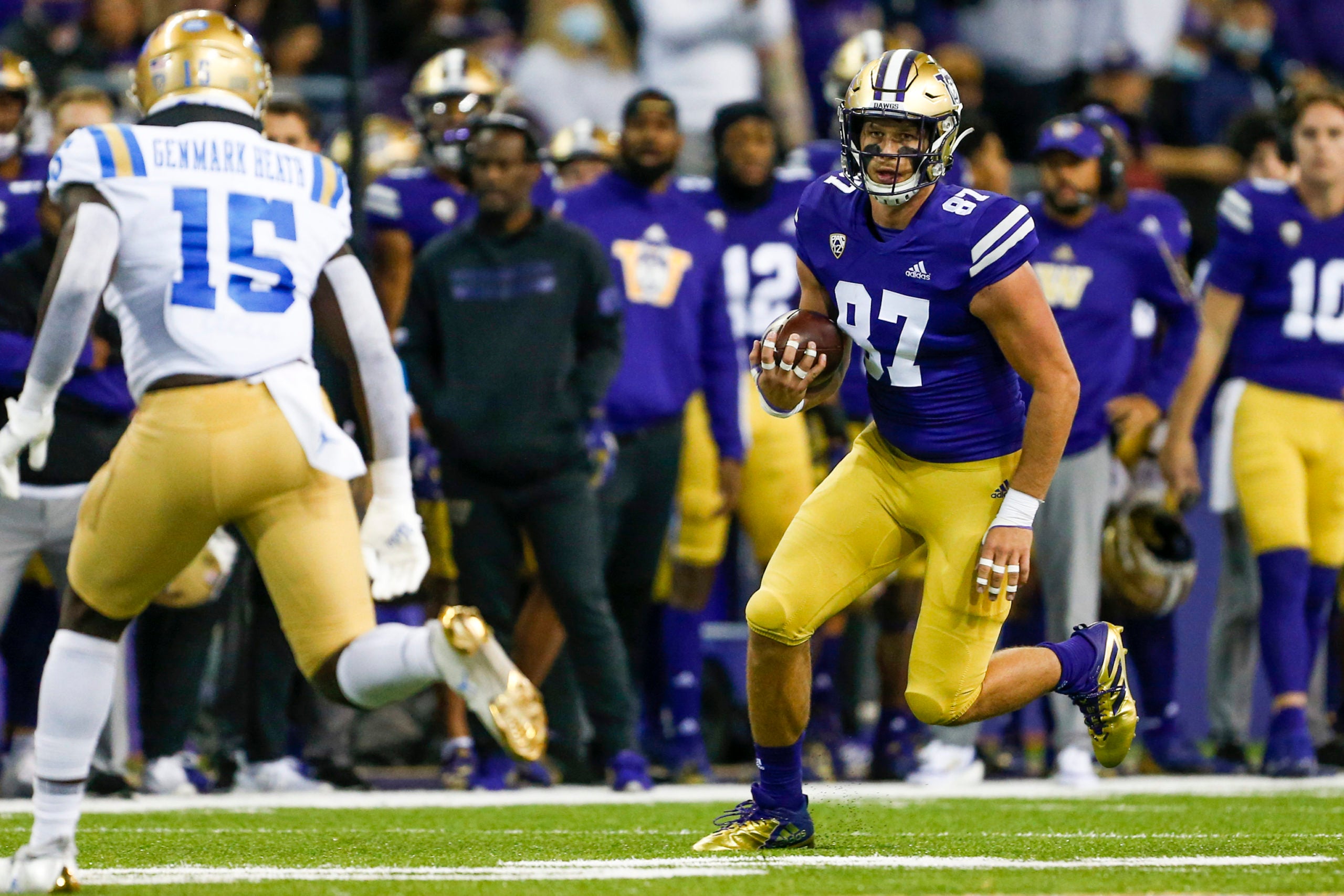 Oct 16, 2021; Seattle, Washington, USA; Washington Huskies tight end Cade Otton (87) runs for yards after the catch against the UCLA Bruins during the second quarter at Alaska Airlines Field at Husky Stadium. Mandatory Credit: Joe Nicholson-USA TODAY Sports