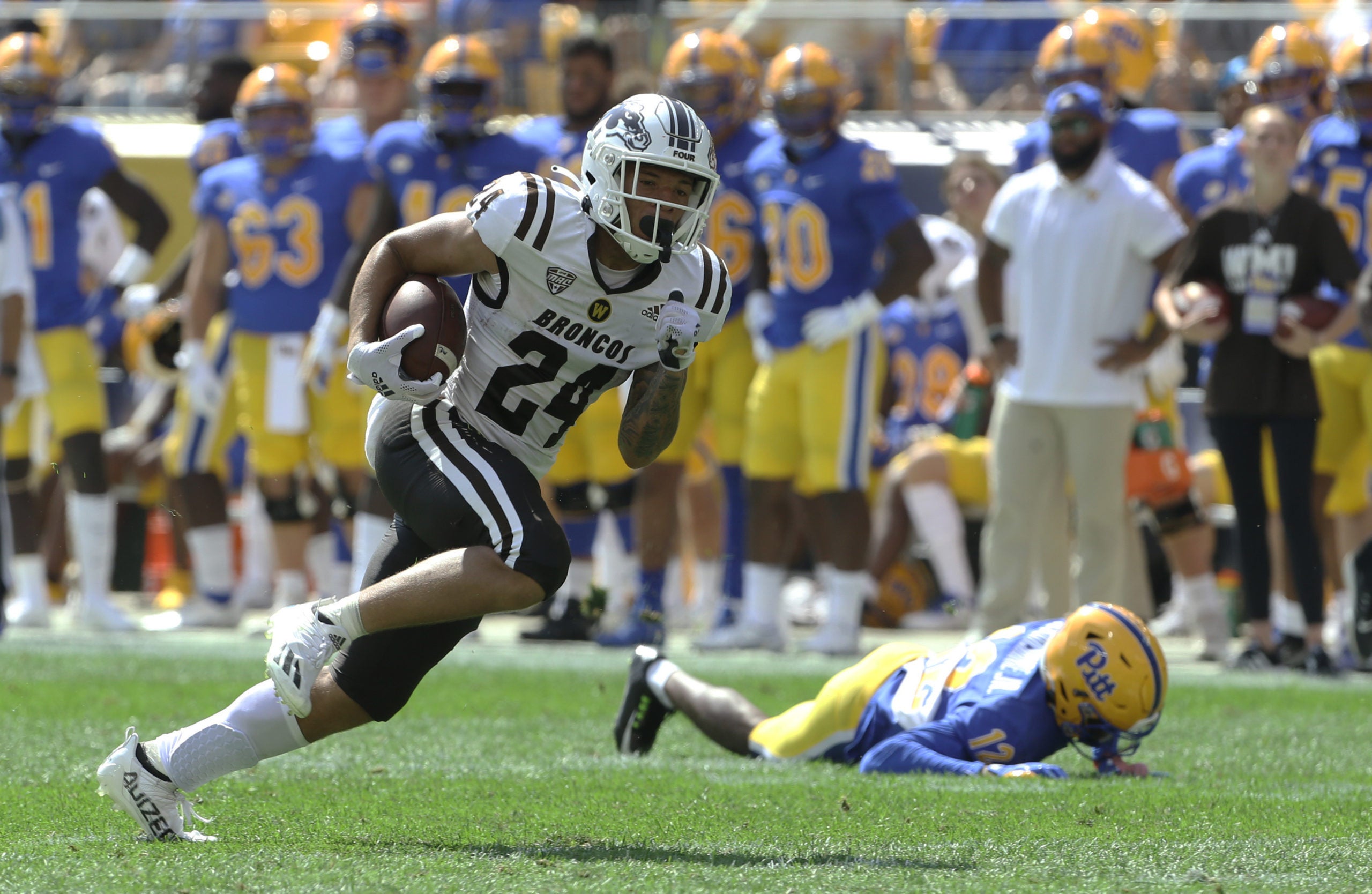 Sep 18, 2021; Pittsburgh, Pennsylvania, USA;  Western Michigan Broncos wide receiver Skyy Moore (24) runs after a pass reception on is way to scoring a touchdown against the Pittsburgh Panthers during the second quarter at Heinz Field. Mandatory Credit: Charles LeClaire-USA TODAY Sports